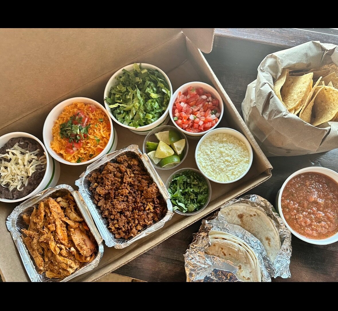 Our Taco Box for 4 is the perfect dinner at home! 🌮 order online at www.elarboltaco.com !