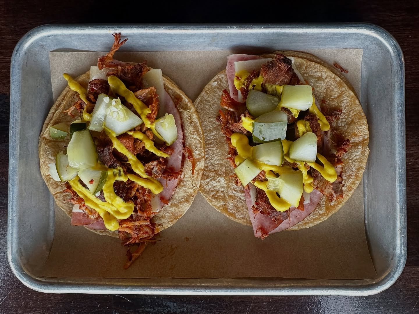 🔥𝔫𝔢𝔴 𝔰𝔭𝔢𝔠𝔦𝔞𝔩𝔰🔥 

&bull;CUBANO TACO- ham carnitas, swiss, mustard, pickles

&bull;KOREAN PORK BELLY TACO- pork belly tossed with soba dressing, kimchi, green onion, toasted sesame seeds