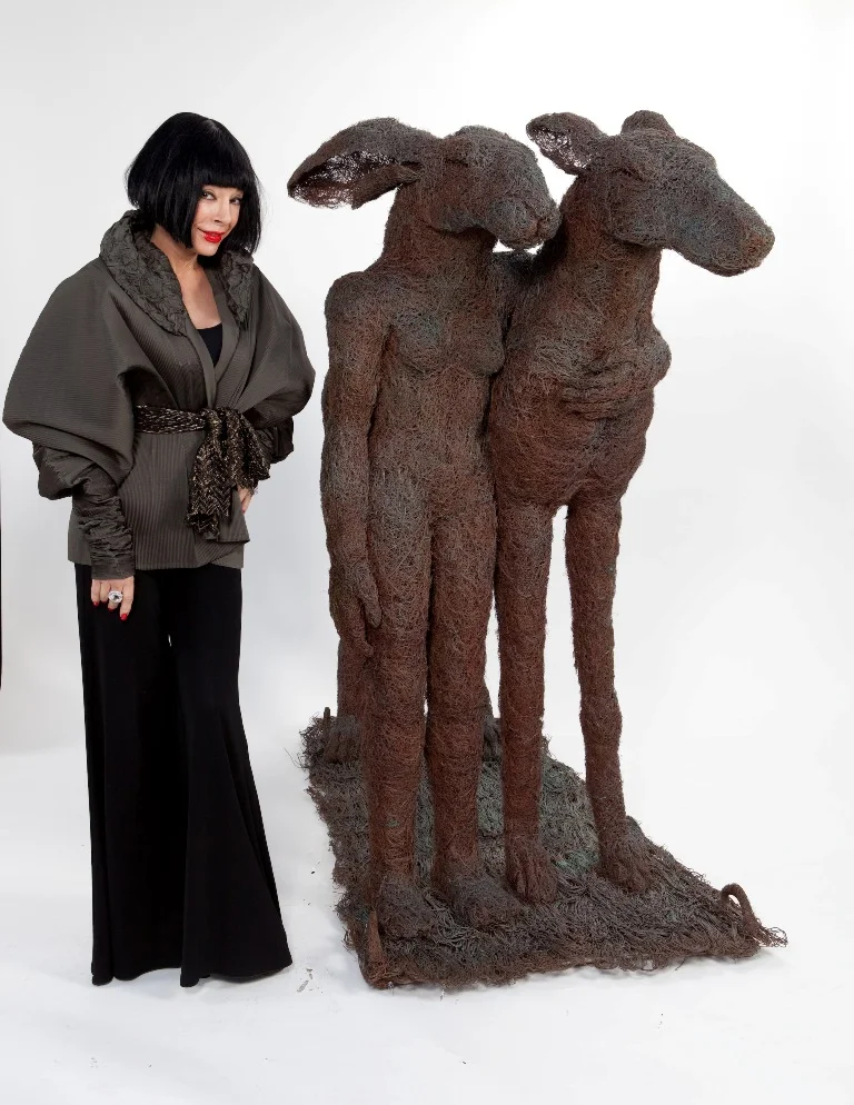 A Midsummer Night’s Dream? Homeira forms a threesome with these sculptural pieces by English artist Sophie Ryder. Photo by Monica Orozco
