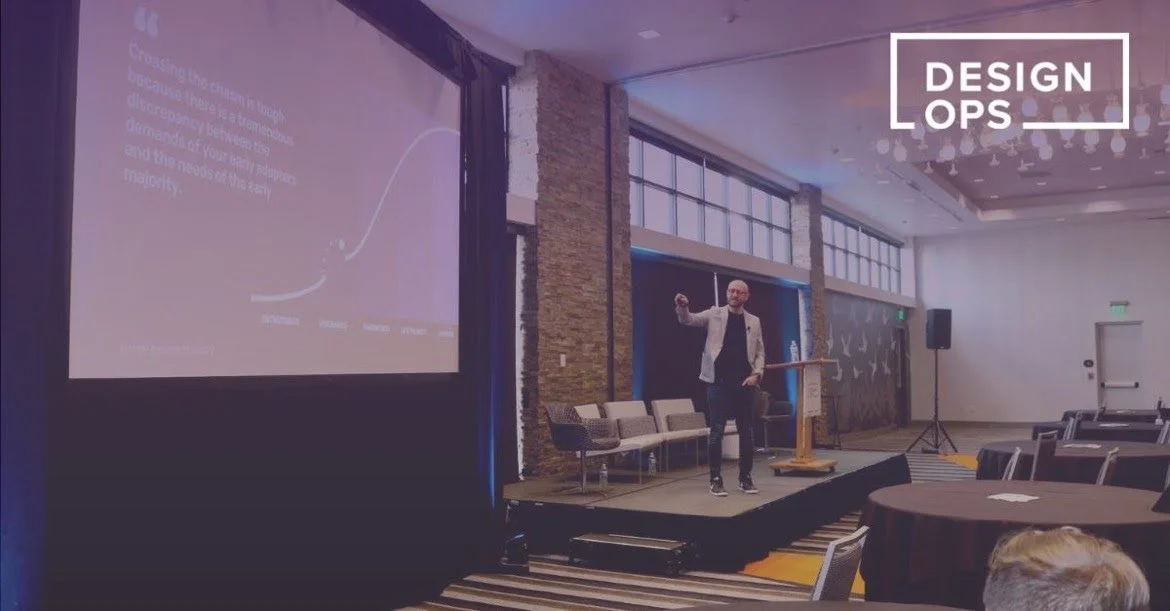 Derek Boman presenting on design system maturity at DesignOps 2022 Conference.