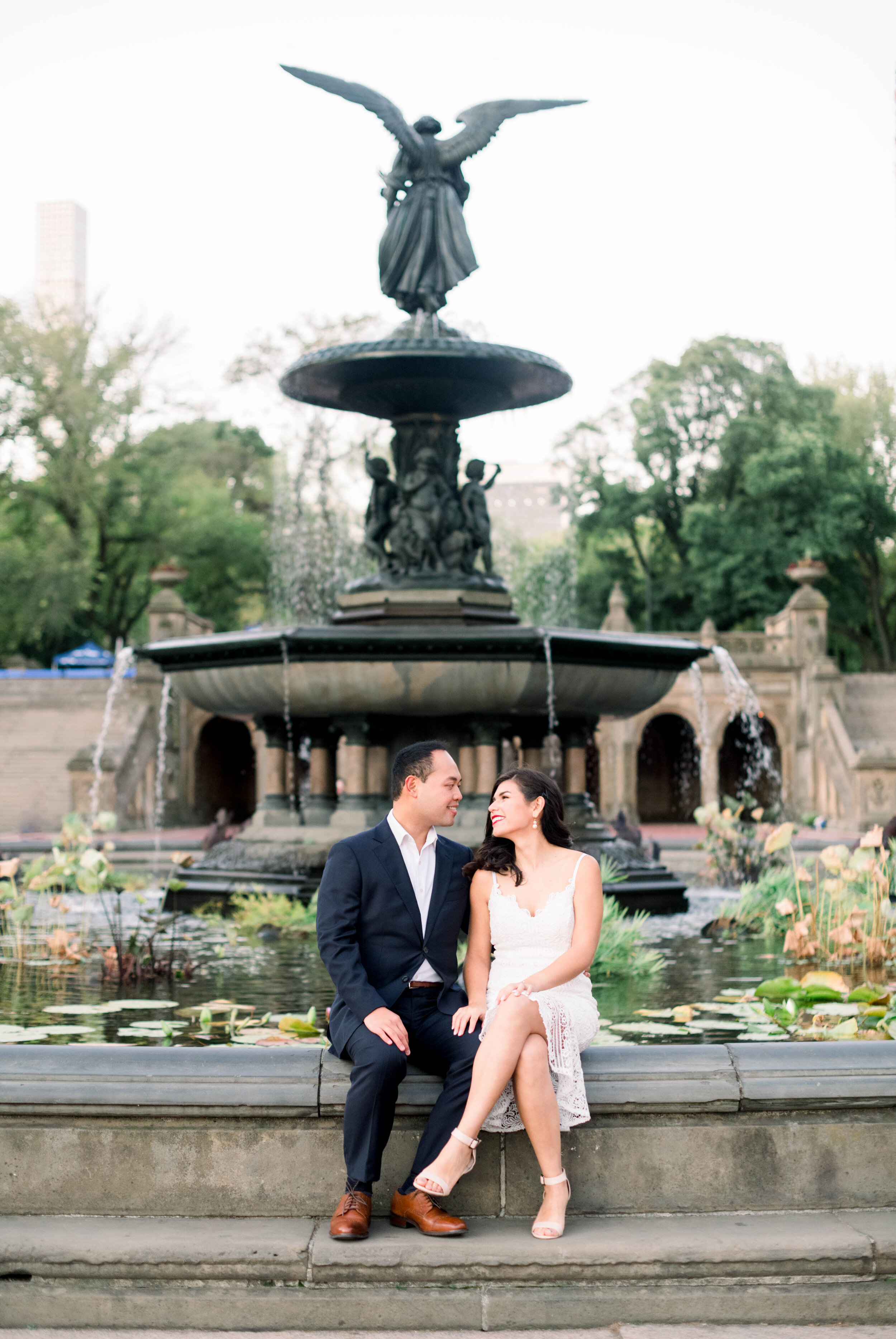 New York city+engagement+Bethesda Fountain+bethesda terrace+Manhattan+wedding+nyc+Central Park+lace dress+white bouquet+photo