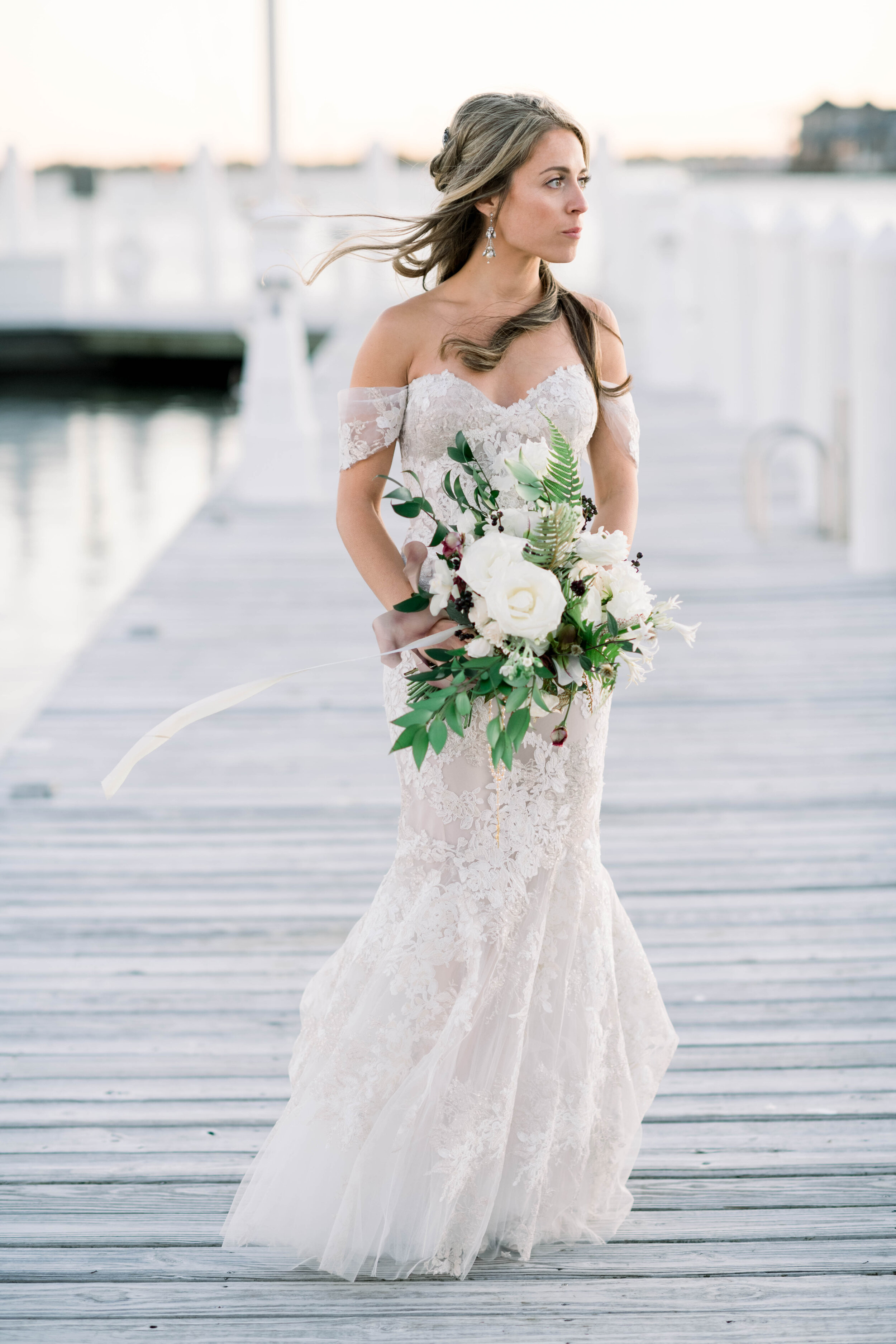 Elegant and glamorous wedding with Monique Lhuillier gown, white organic florals, and sunset portraits at Bay Head Yacht Club in Bay Head, New Jersey by Liz Andolina Photography