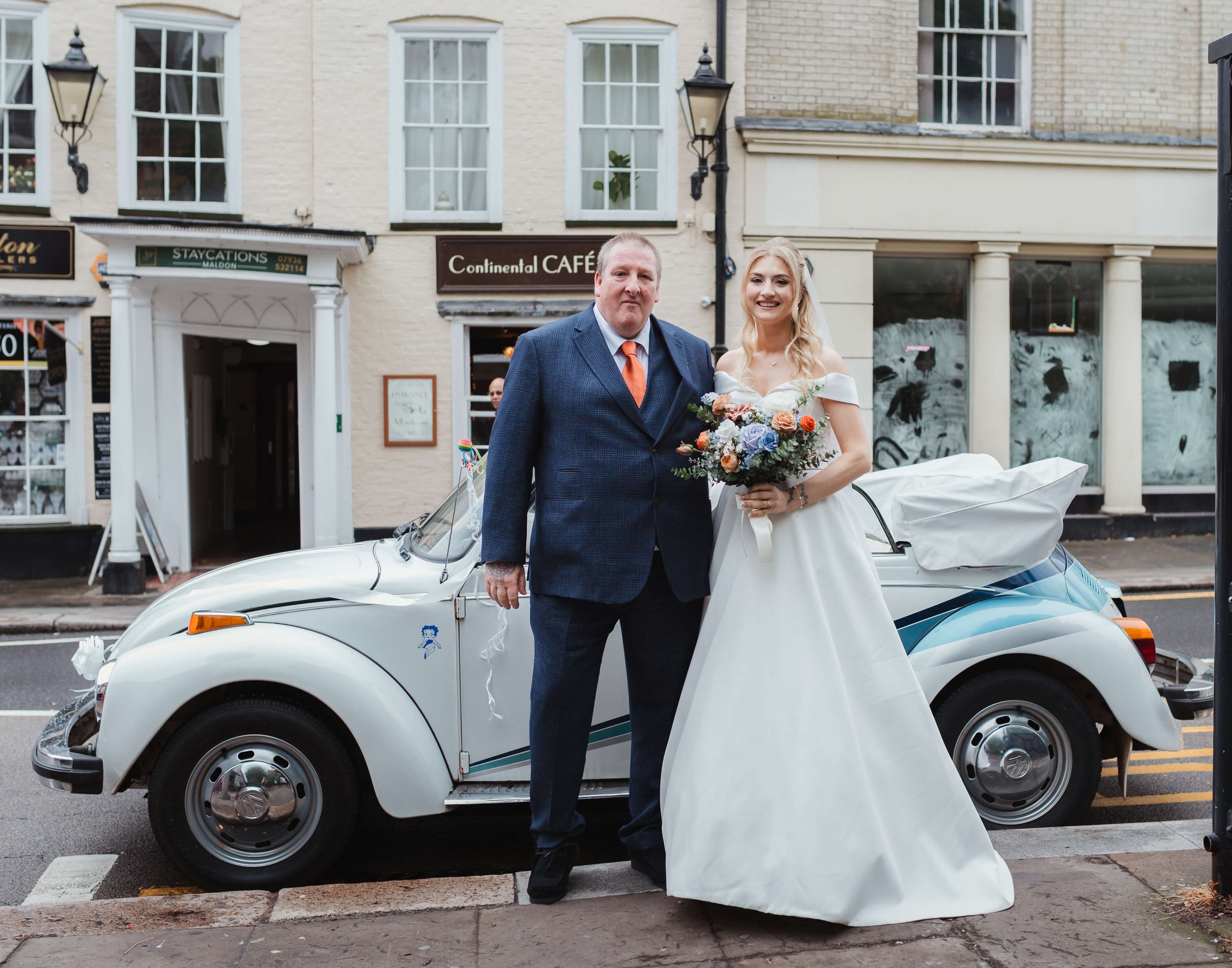 bride arriving at her wedding venue with father in Maldon town