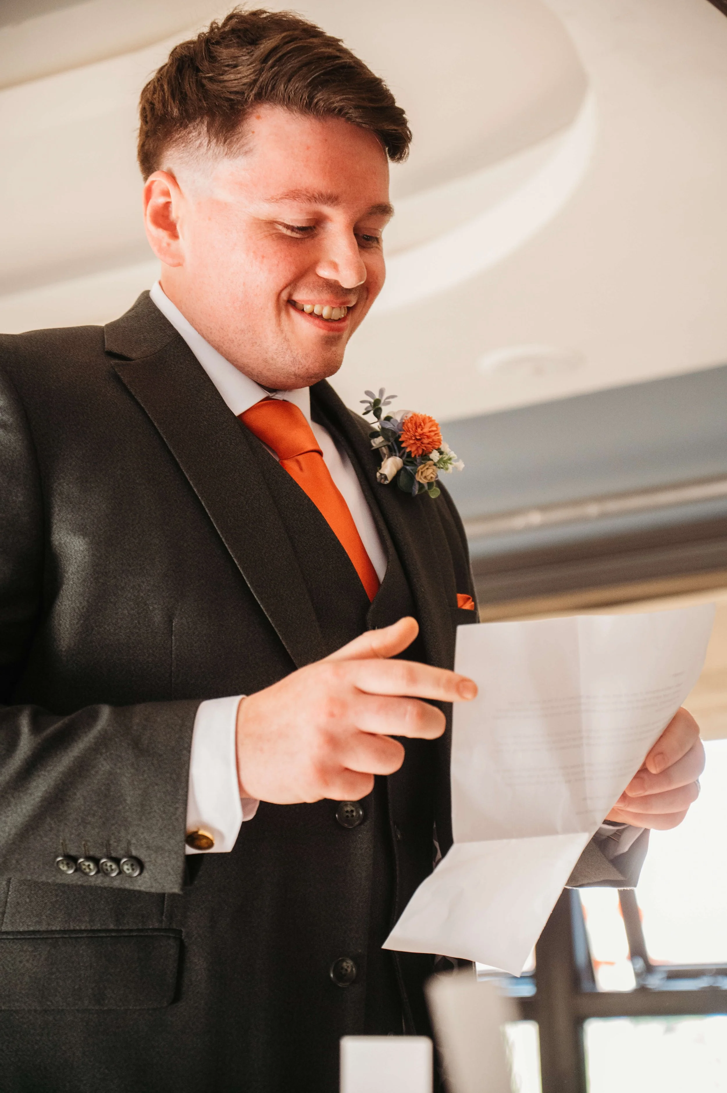 groom reads his speech 