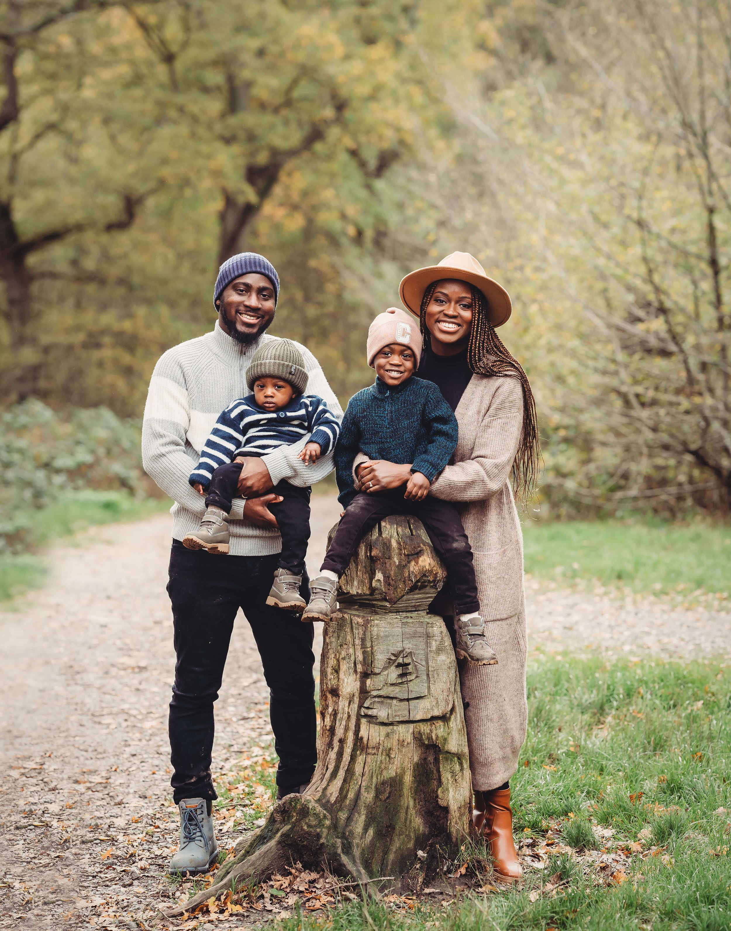 family having photograph in woods