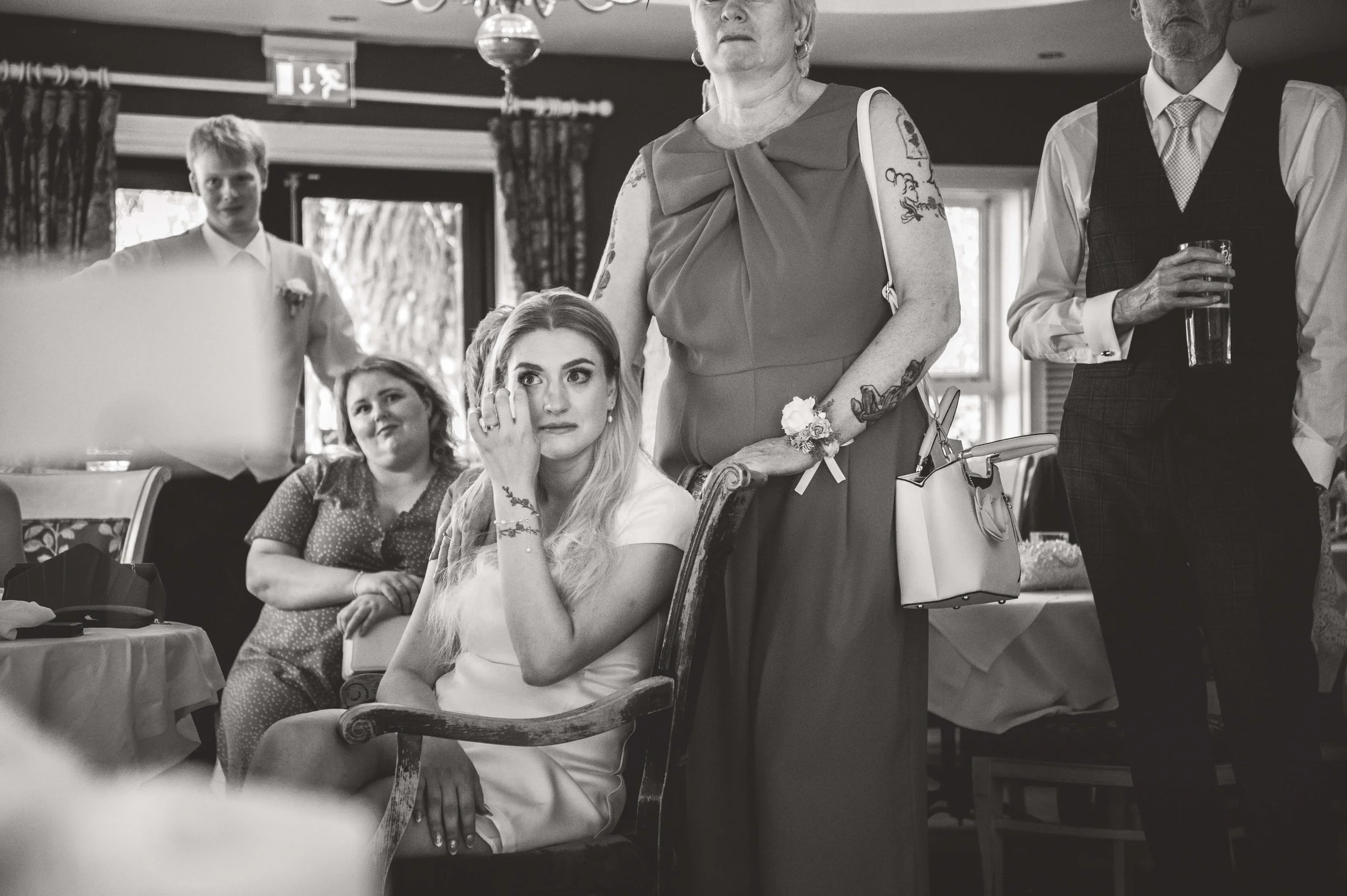 bride emotional listening to her dads speech 