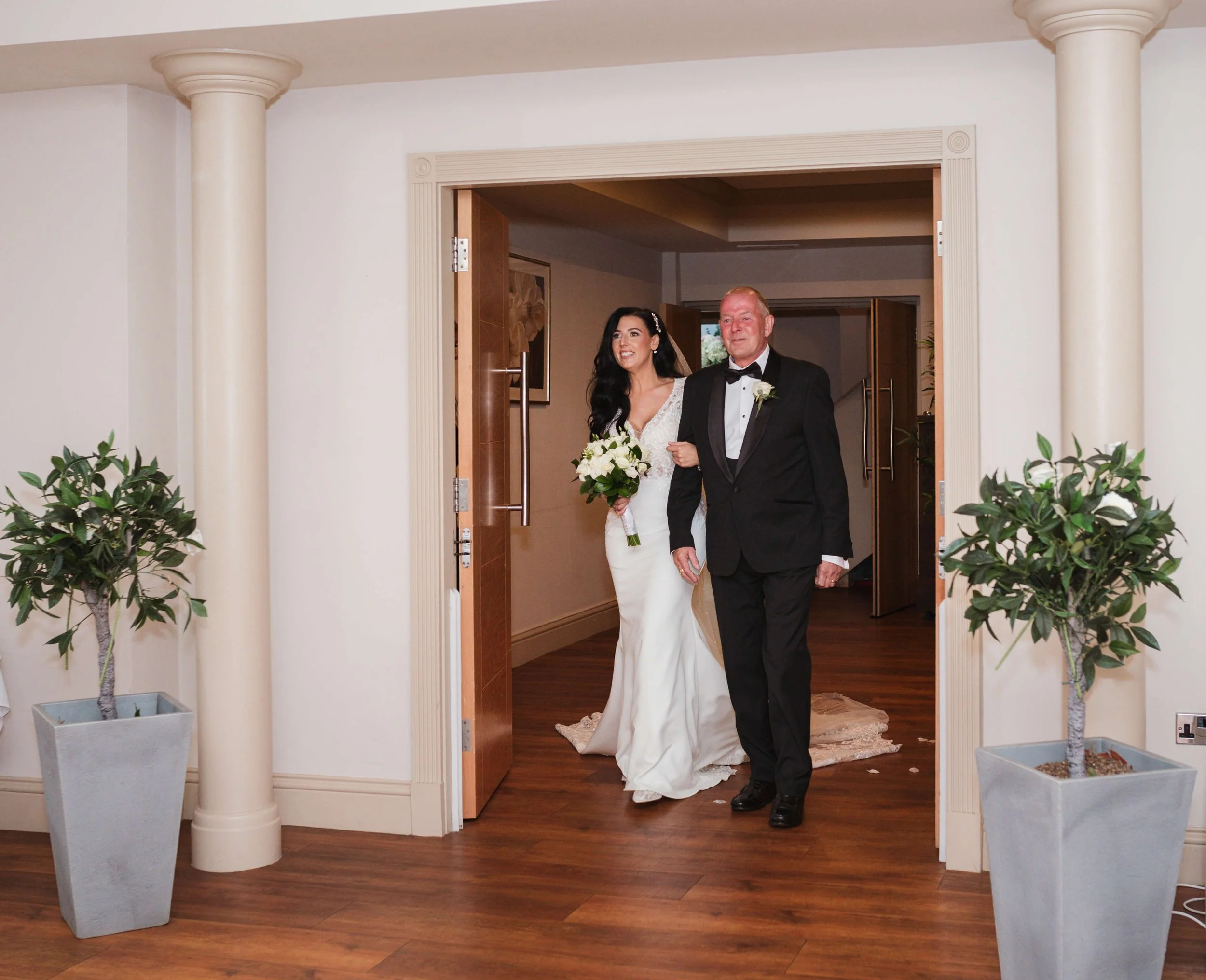 bride entering the Rochford hotel ceremony room 