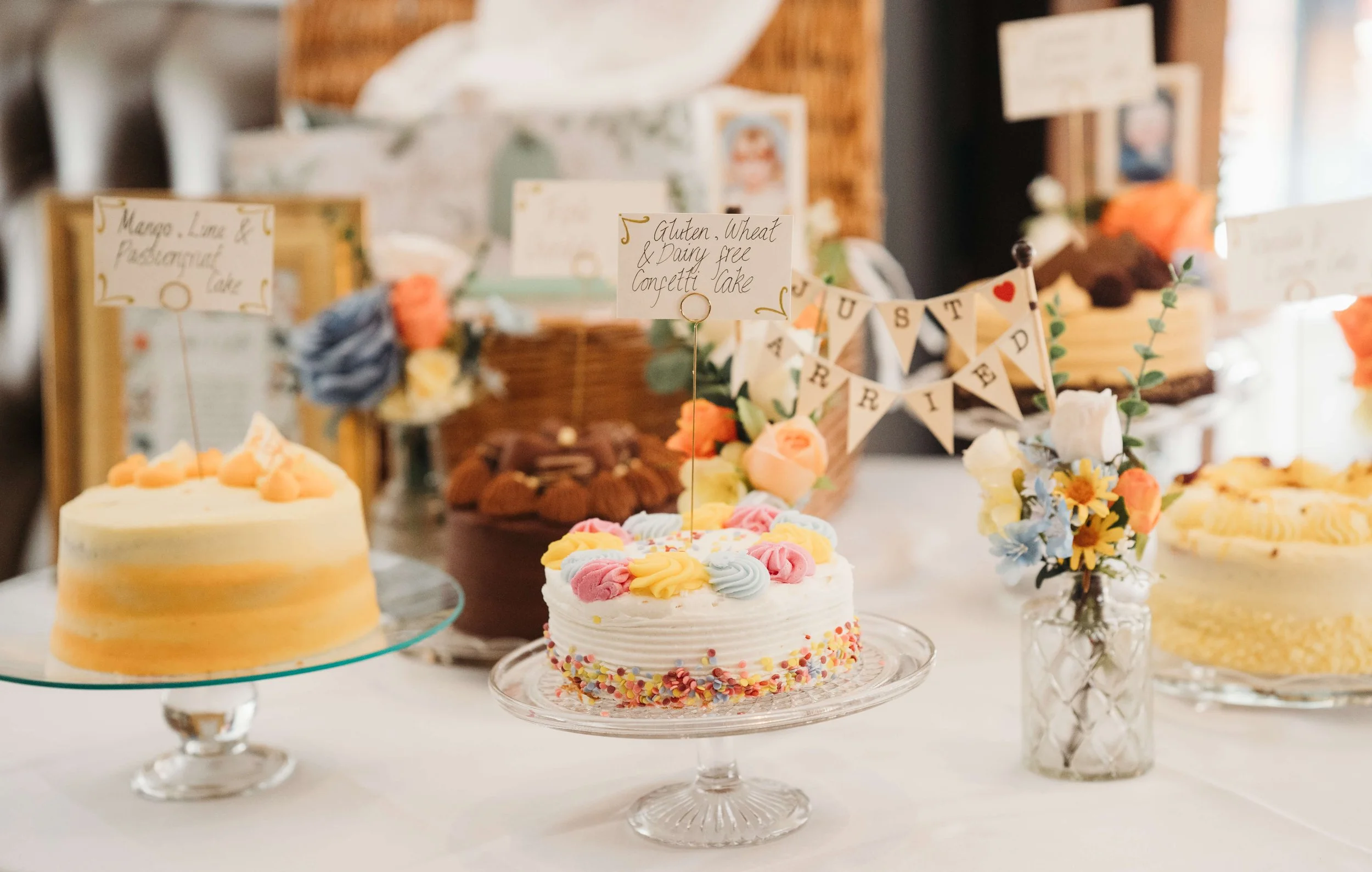 wedding cakes and table display photographed in soft window light 