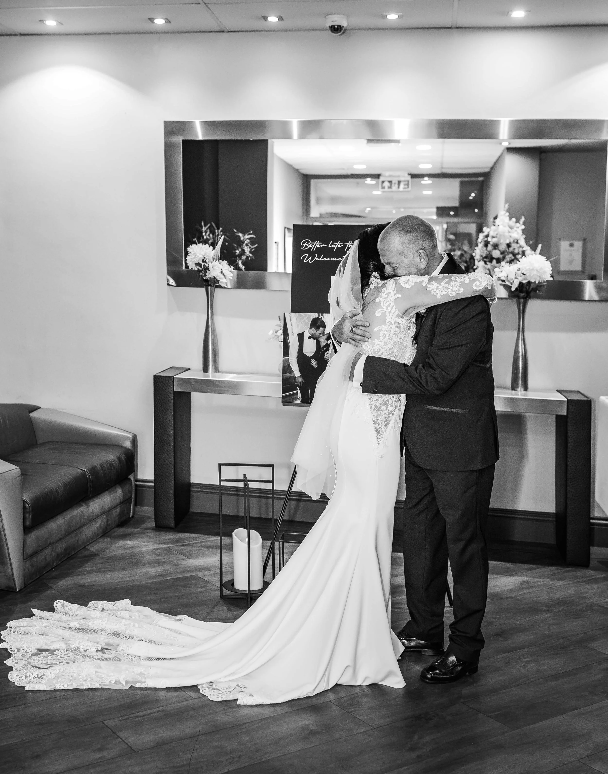 brides father embraces bride at first look
