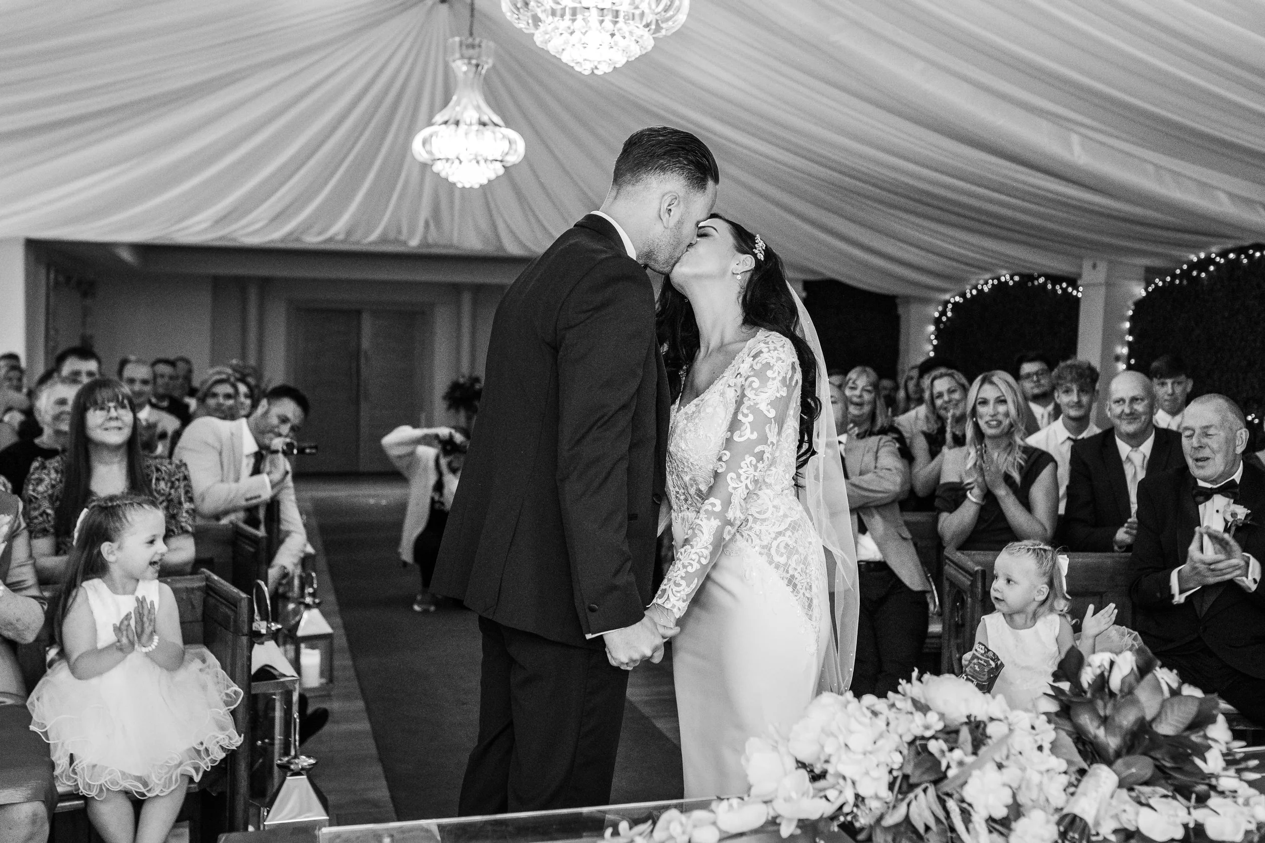 bride and groom first kiss as husband and wife
