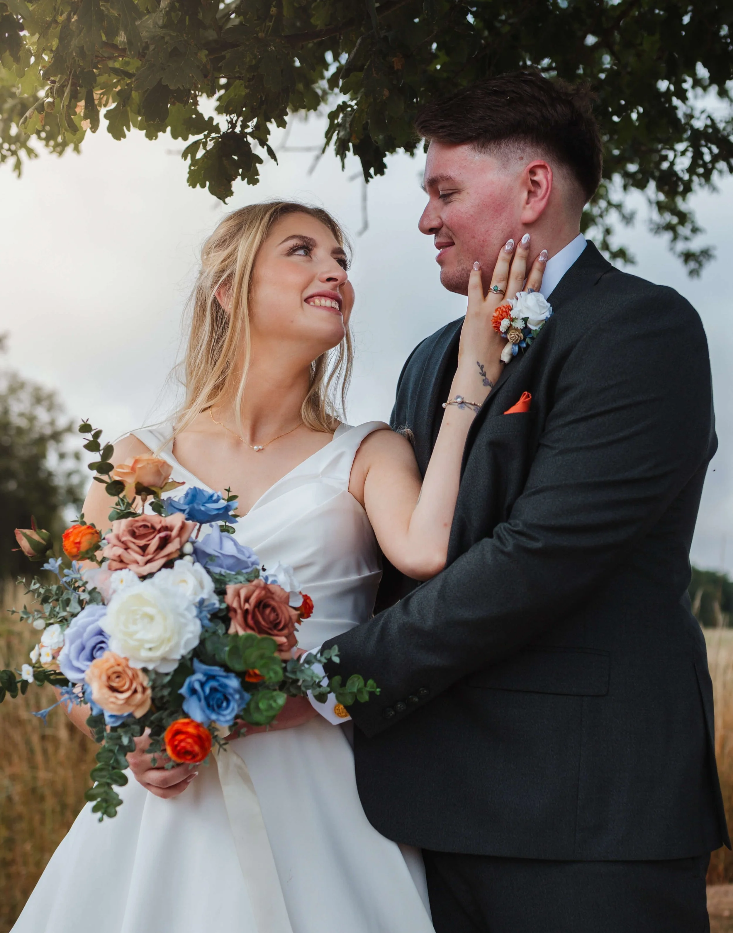 bride and groom looking lovingly into each others eyes 
