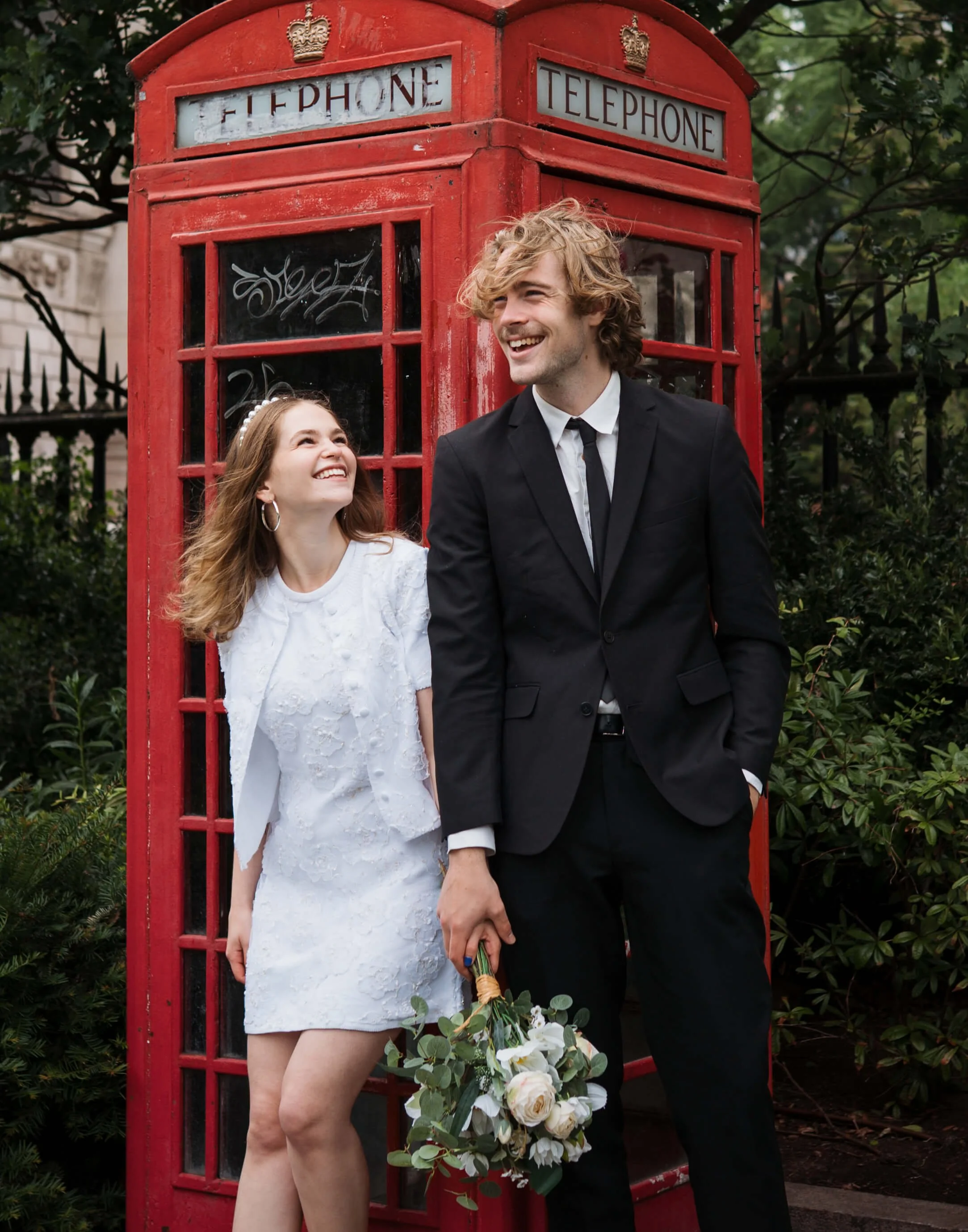 bride and groom laughing 