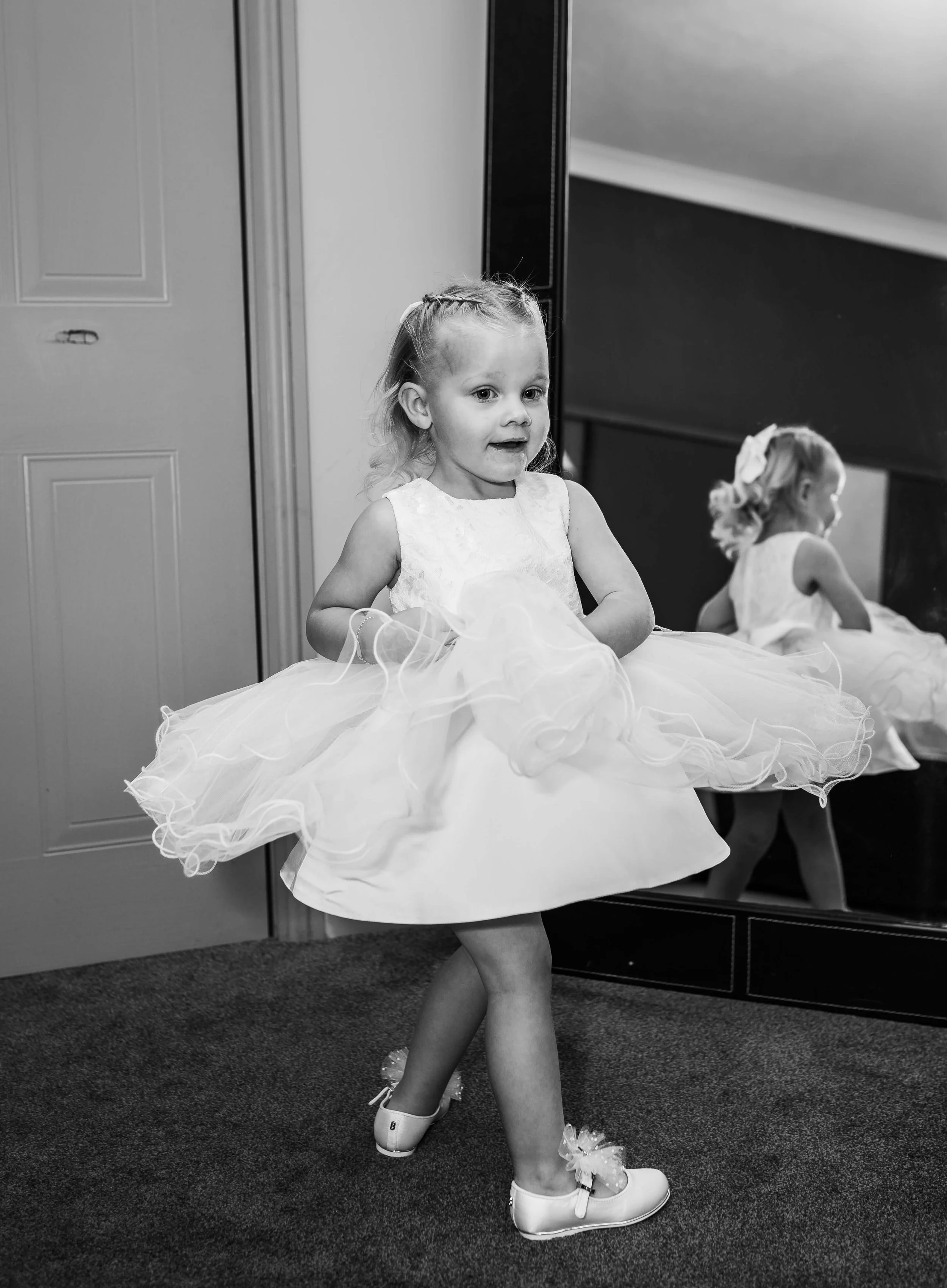 flower girl dancing in mirror 