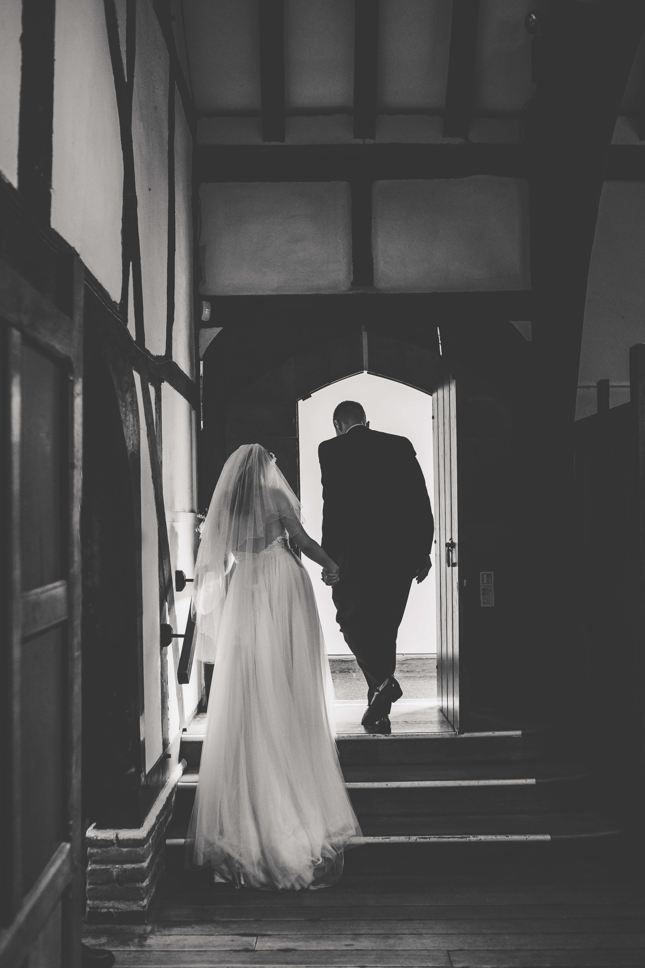 bride and groom leave wedding reception at Southchurch House Southend On Sea wedding venue