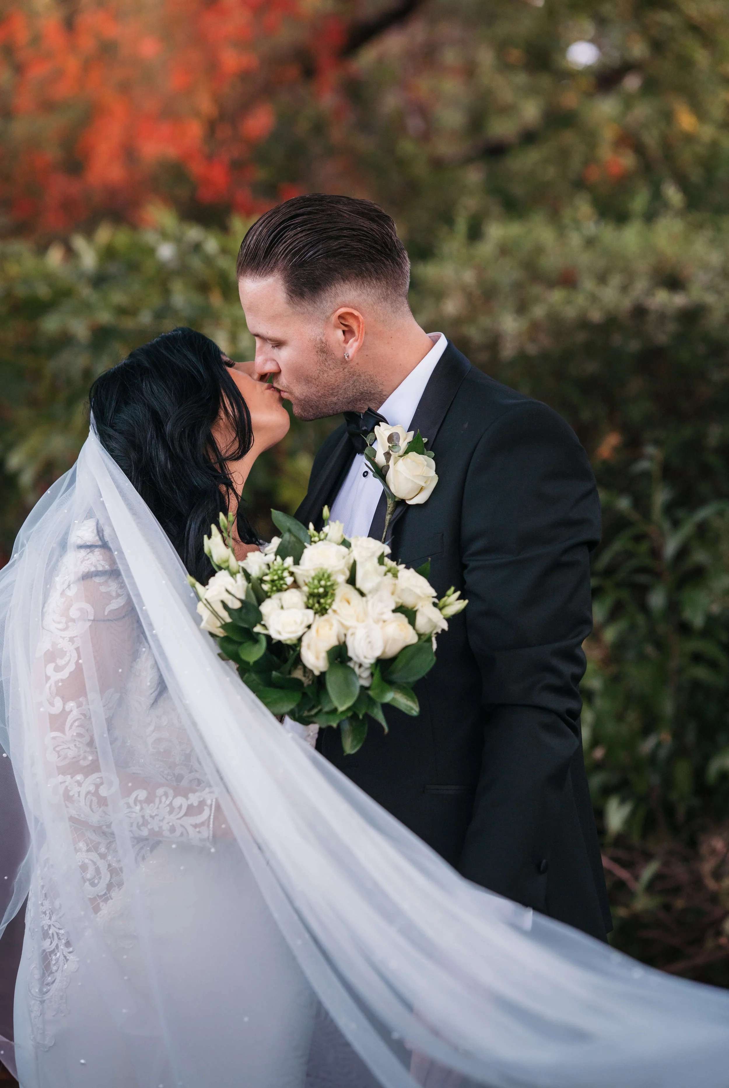 Essex Wedding, Rochford Hotel, bride and groom kissing