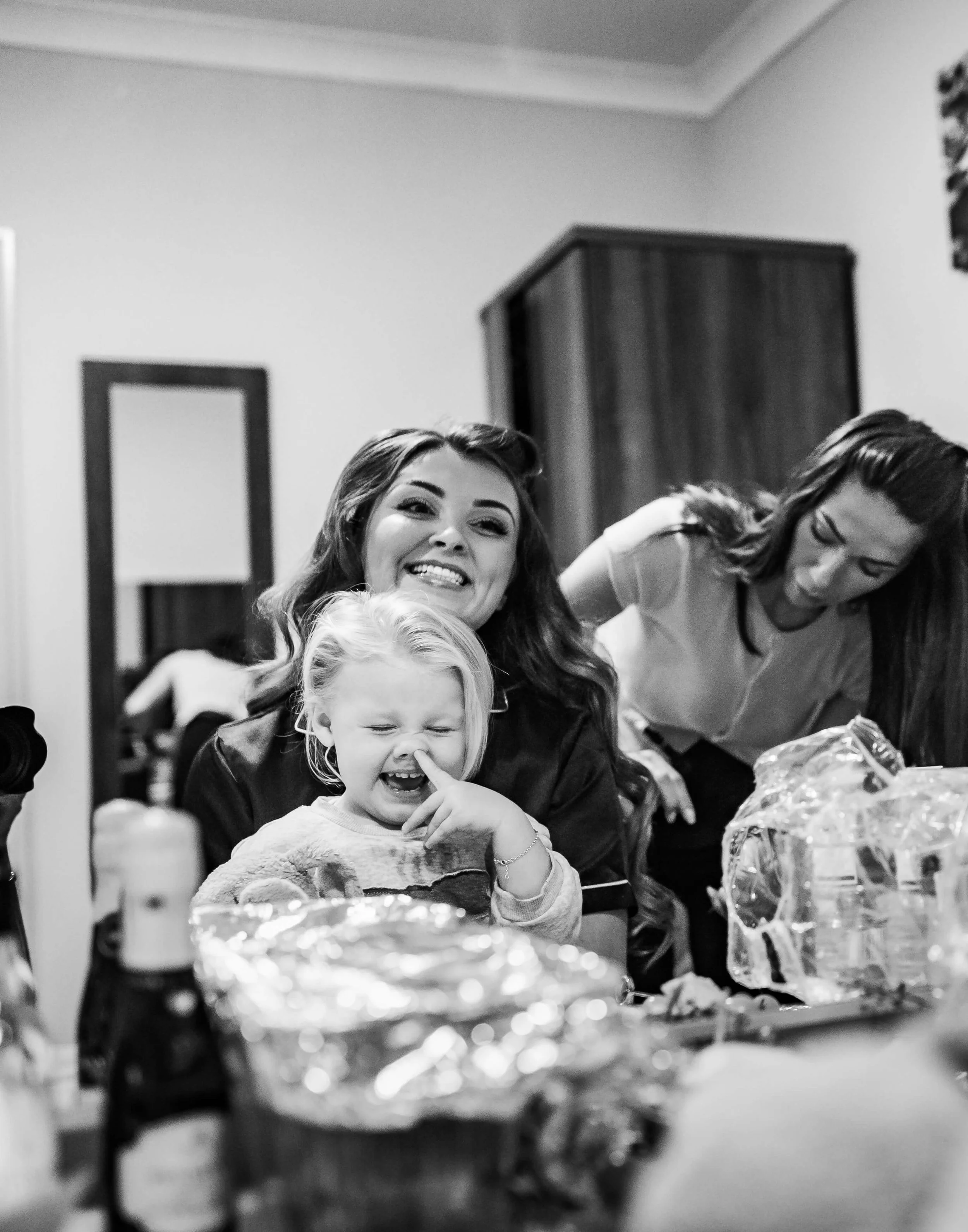 flower girl picking her nose
