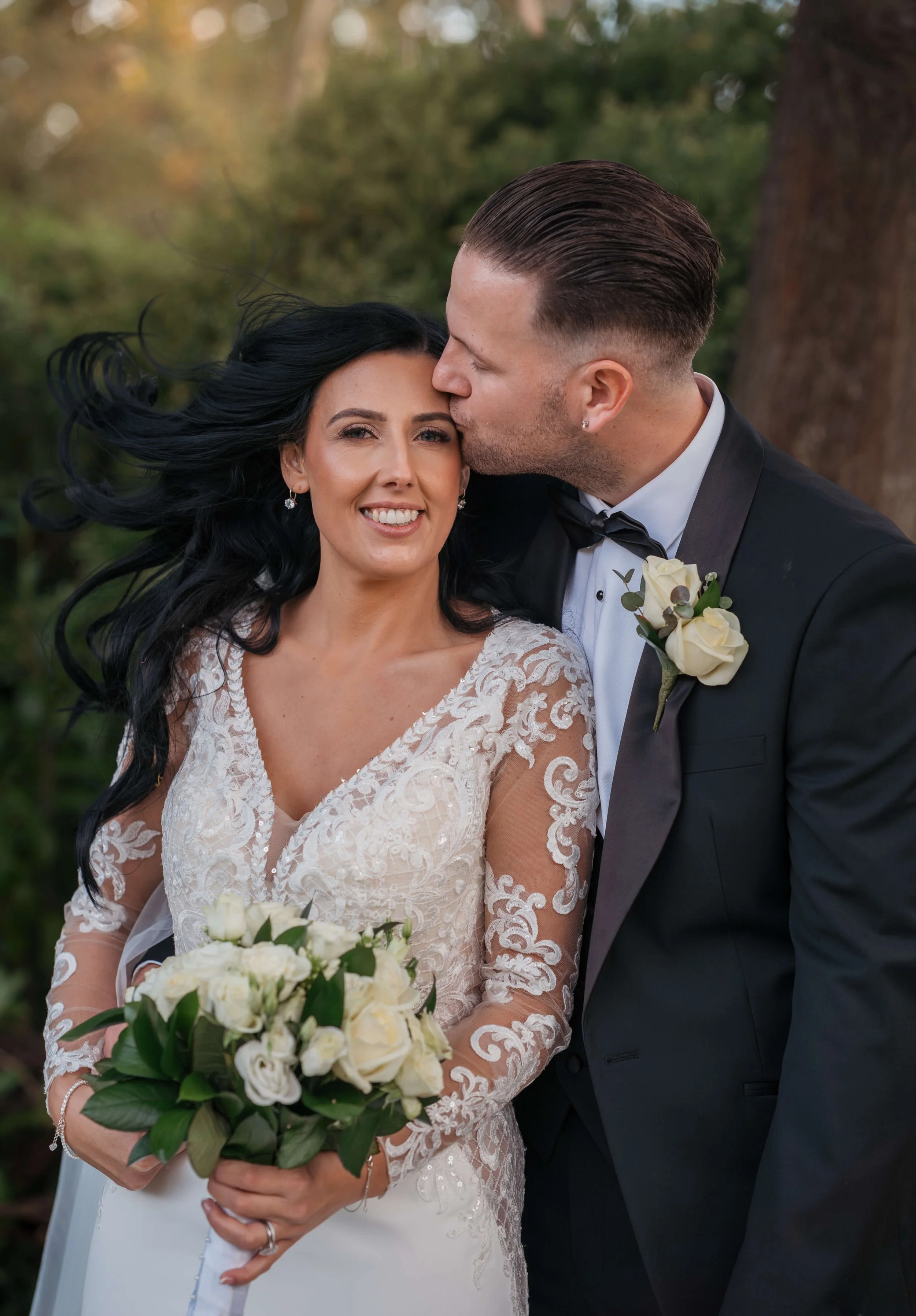bride and groom portrait in the grounds of wedding venue in essex