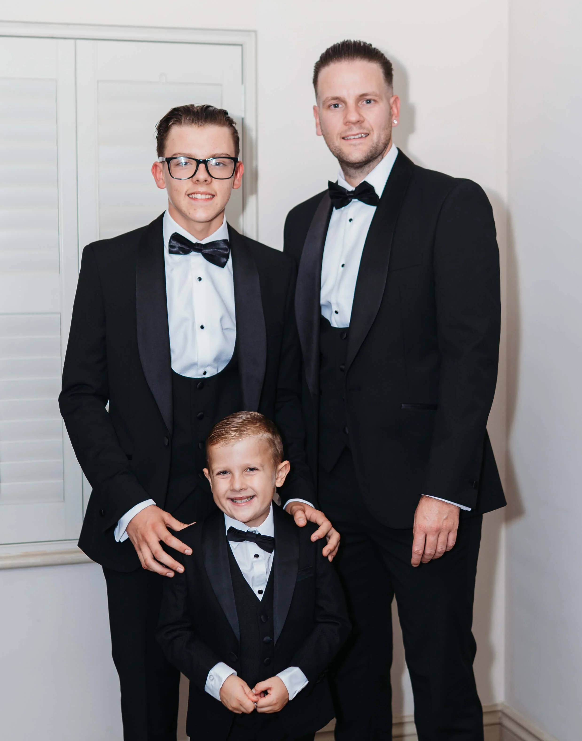 groom and his sons after getting ready