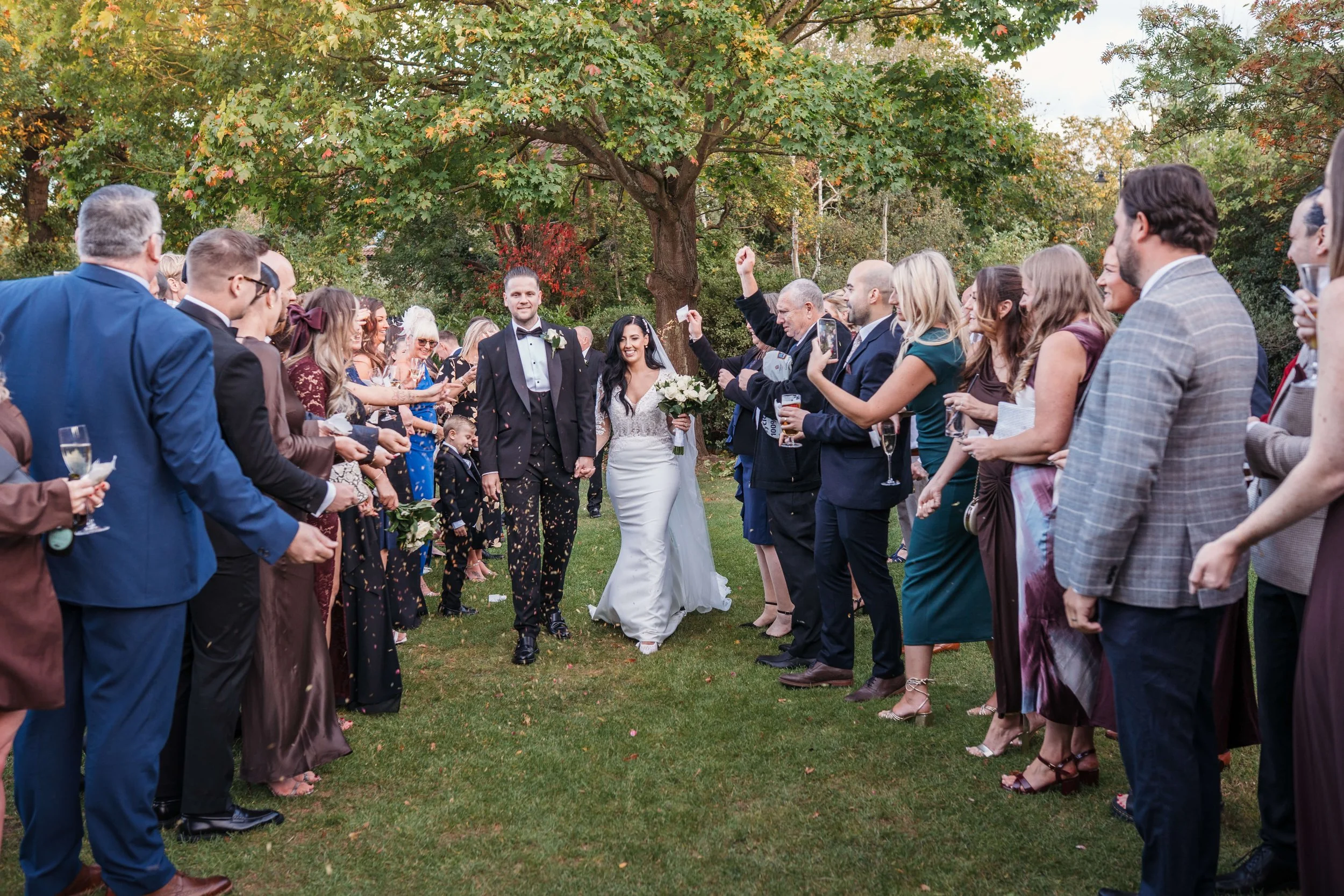 confetti throw with bride and groom 