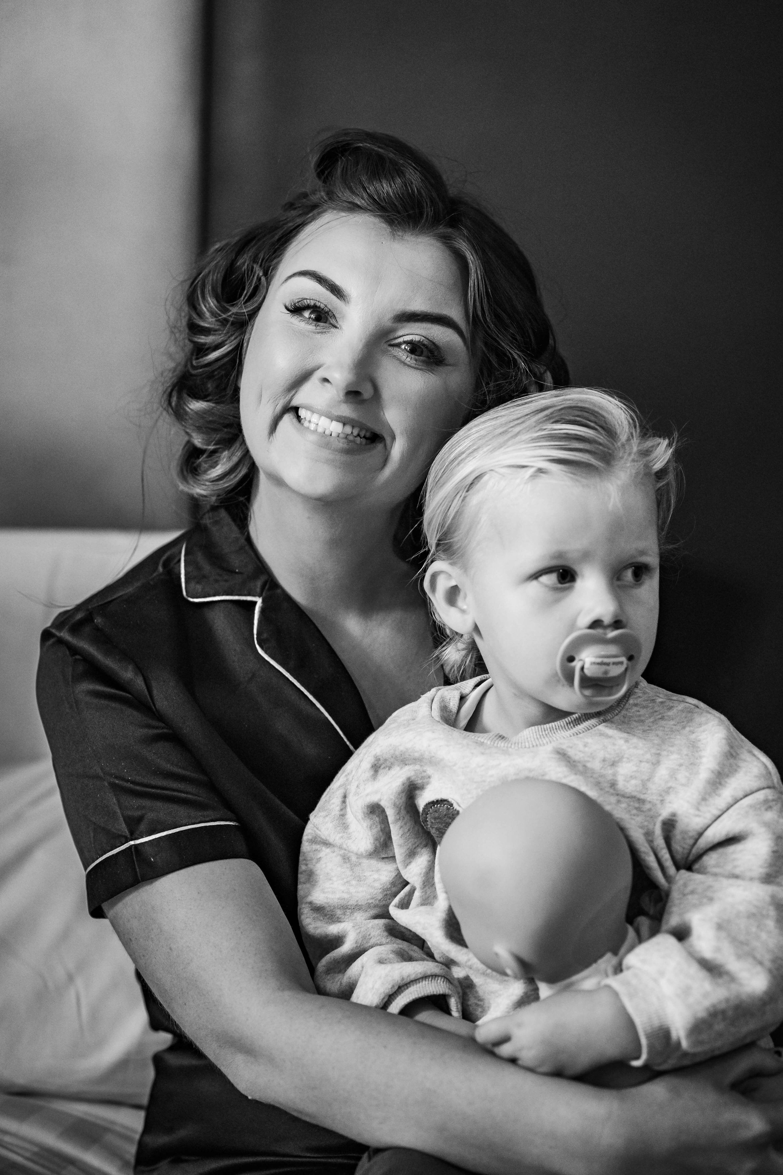 candid shot of bridesmaid and flower girl