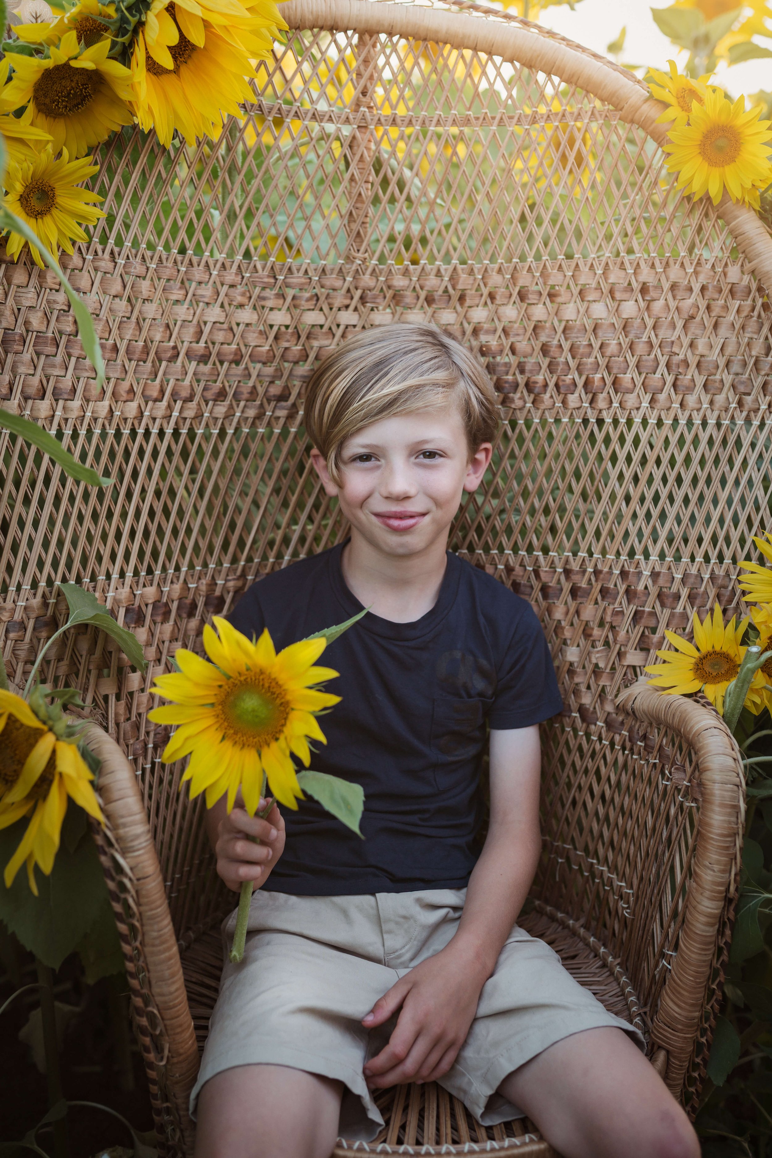 boy with sunflowers 