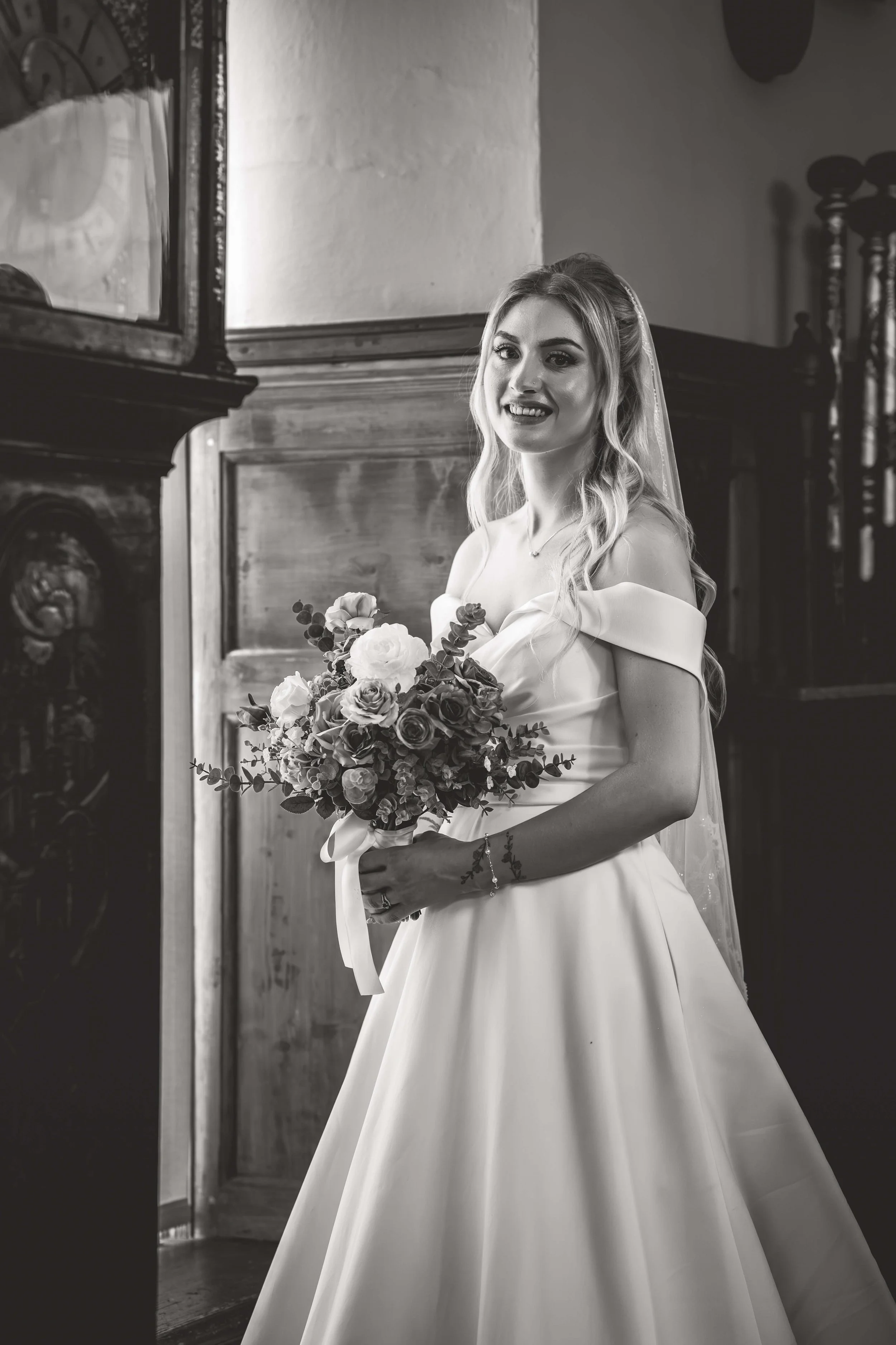 editorial photograph of bride lit by window light 