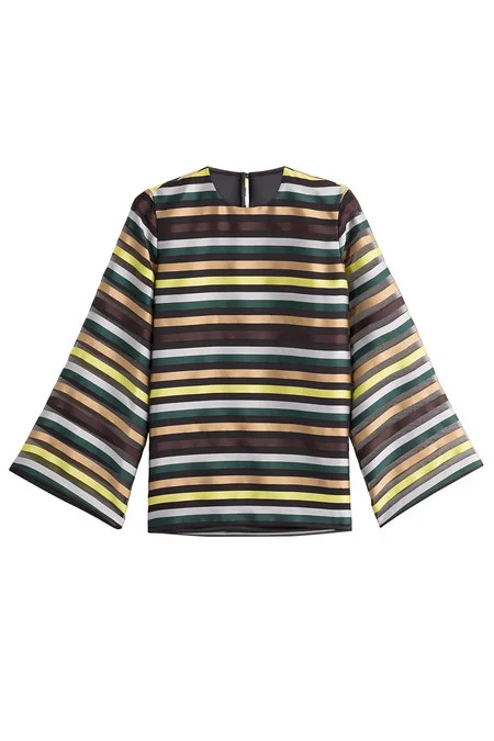 And for a shirt that can go either way, we can’t get enough of this Emilia Wickstead striped top.