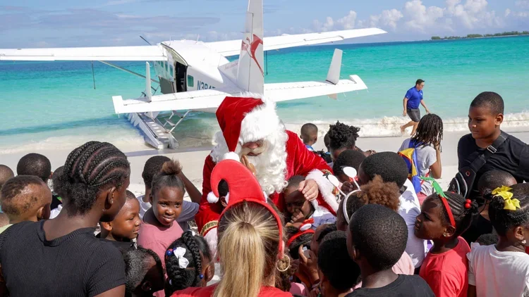 Saving+the+Blue+-+501+c+3+-+Nonprofit+-+Not+for+Profit+-+Fraser+Yachts+-+Tropic+Ocean+Airways+-+Bahamas+-+Andros+-+The+Berry+Islands+-+Santas+Seaplane+-+Christmas+2023+-+Father+Christmas+-+Seaplane+-+Santa+-+Give+Back (1).webp