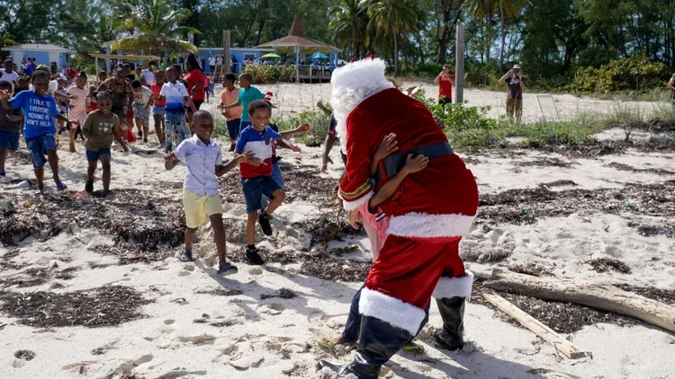 Saving+the+Blue+-+501+c+3+-+Nonprofit+-+Not+for+Profit+-+Fraser+Yachts+-+Tropic+Ocean+Airways+-+Bahamas+-+Andros+-+The+Berry+Islands+-+Santas+Seaplane+-+Christmas+2023+-+Father+Christmas+-+Seaplane+-+Santa+-+Give+Back (2).webp