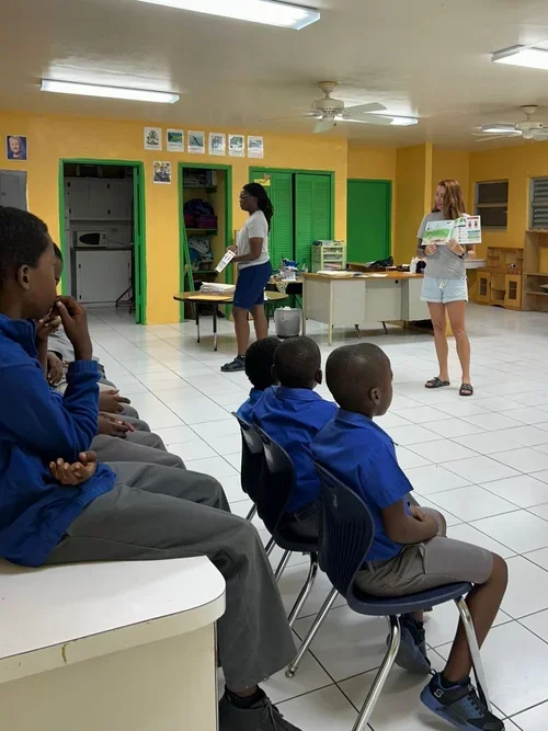 Saving+the+Blue+-+Annie+Guttridge+-+Nonprofit+-+The+Bahamas+-+Research+-+Marine+Biology+-+Sawfish+-+Smalltooth+Sawfish+-+School+Visit+-+Outreach+-+Red+Bay+-+Education+-+Which+Faces+Belong+In+These+Places+-+Annies+Book+-+501c3+-+donatio (1).webp