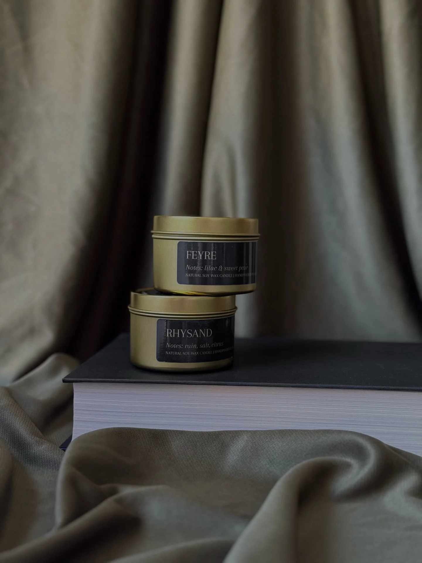 🔥We need your help!!!🔥 We are thinking about expanding our Romantasy Collection by adding larger jars to pair with these gold tins candles. We are considering:

1. Midnight Black
2. Forest Moss
3. Sand Dune

➡️👀 Swipe to see the jars!

💬Comment b