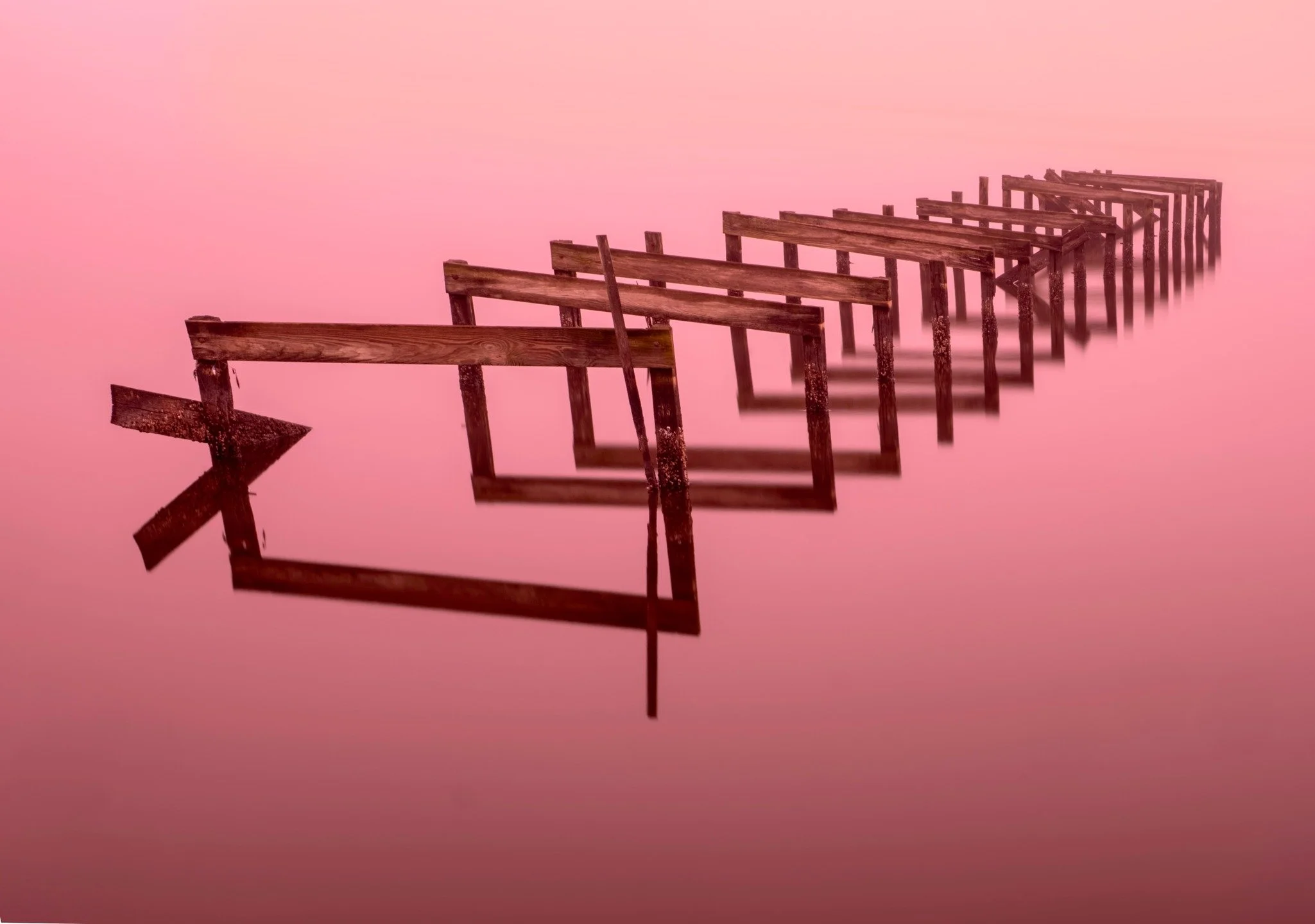 An old pier
Live composite to make the water smooth at the ocean. 

Taken with my @omsystem.cameras M Zuiko 12-100mm lens on my OM-1 camera using daylight live composite on bulb mode

@omsystem.americas 
#omsystem #pier #longexposure #livecomposite #