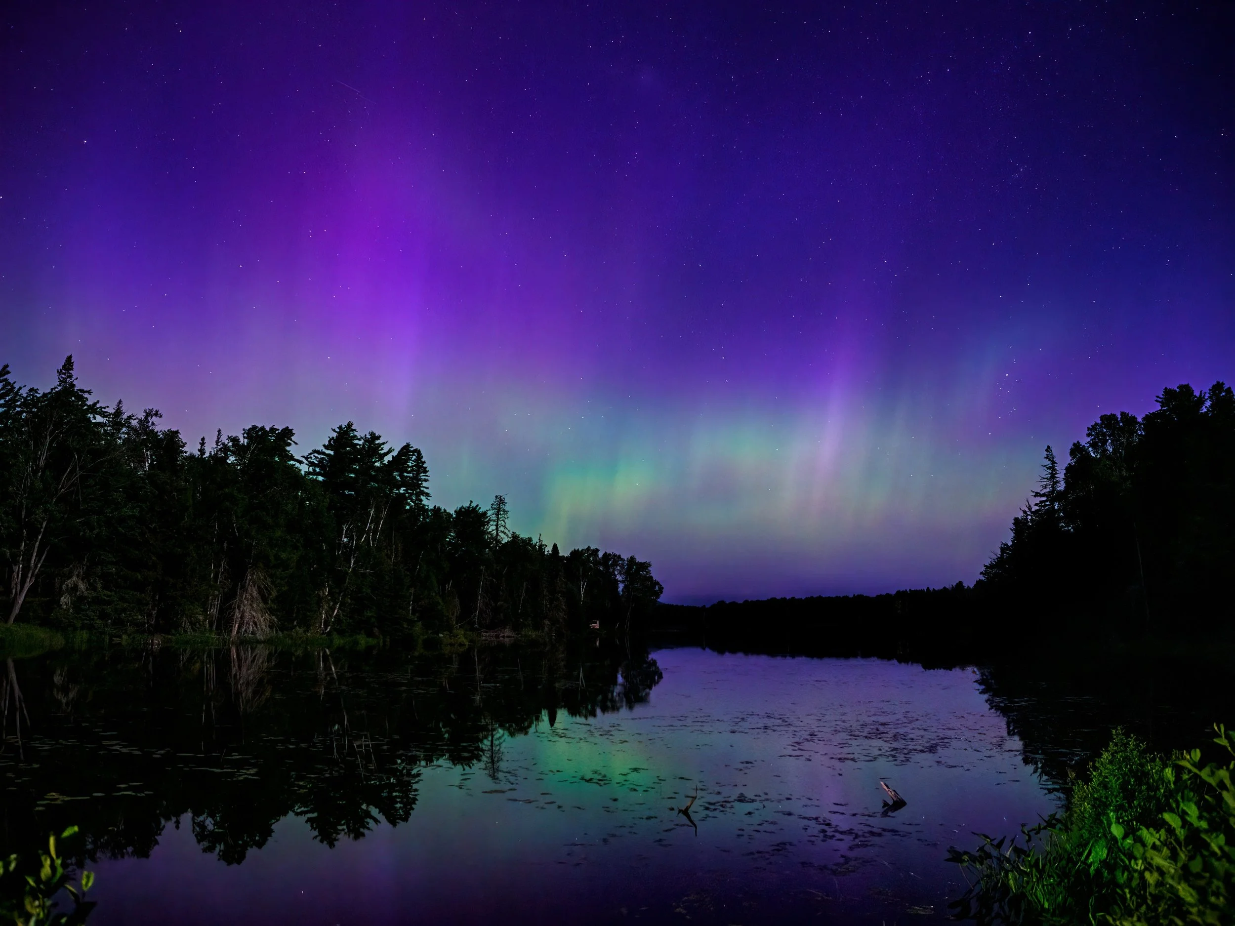 Aurora borealis. Taken with the @omsystem.americas OM-3 camera and M Zuiko 12-40 f2.8 II lens

f2.8 iso 3200

Although we call them the Northern Lights, they begin their journey 93 million miles away. Charged particles from the Sun race toward Earth 