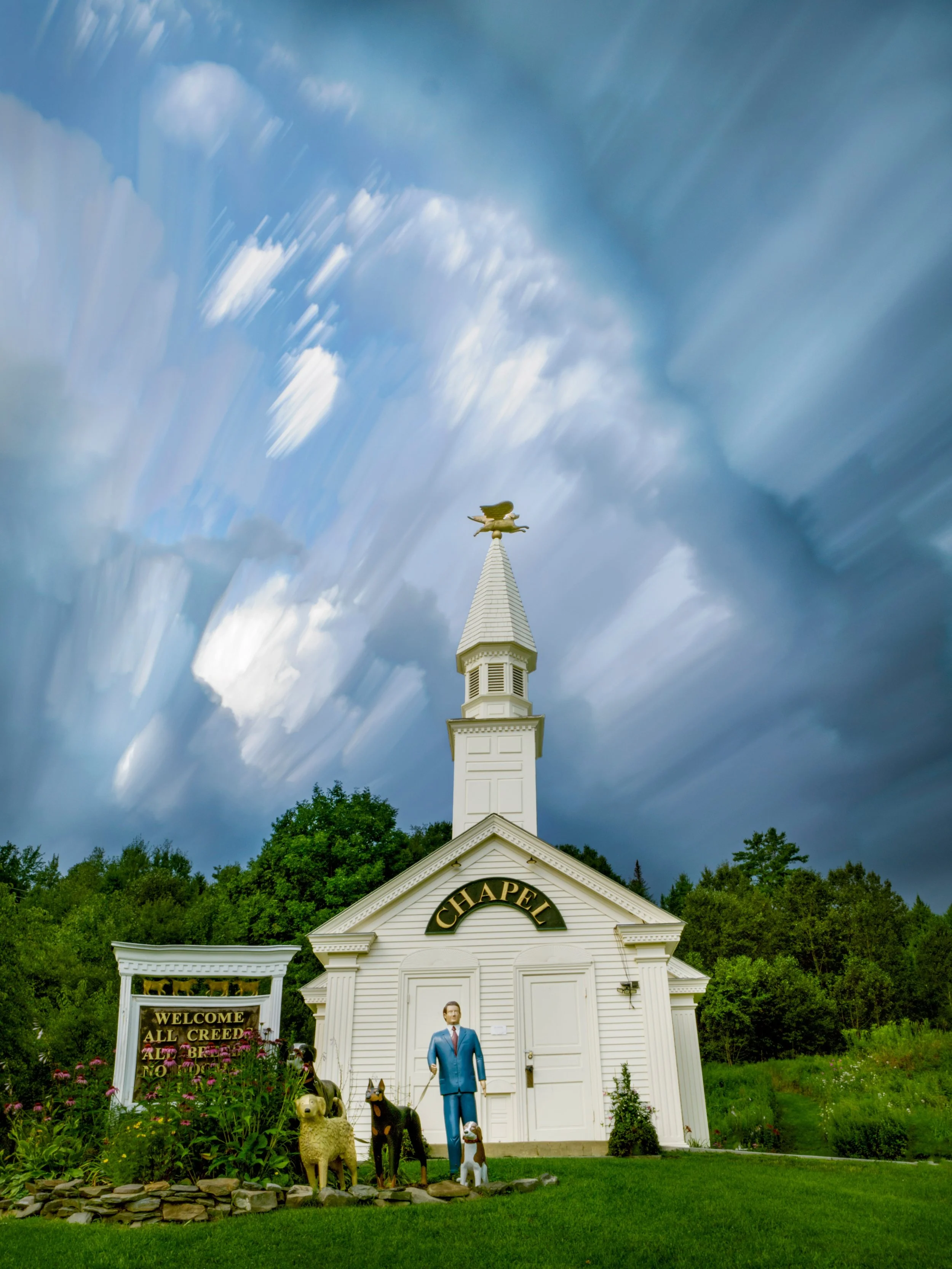 "A Two-Hankie" location
The Dog Chapel

Cloud Stacking using Daylight Live Composite 
30 2-second exposures stacked in camera

Taken with the @omsystem.americas M Zuiko 12-100mm lens on the OM-3 

#omsystem #lisatomphotos #dogchapel #saintj