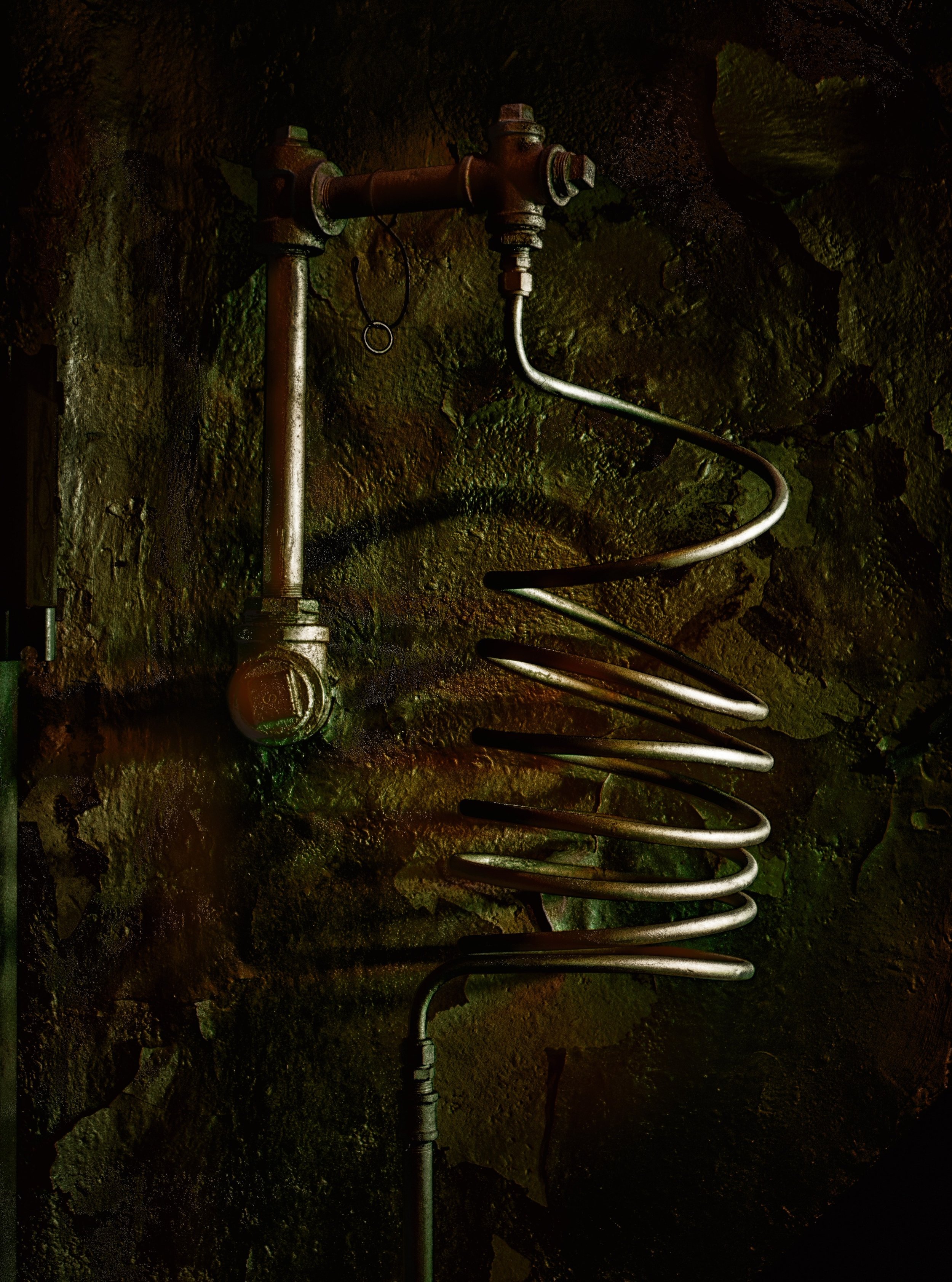 Light painted (during the day) using live composite with 1/2 second exposures stacked on lighten blend mode using live composite

The coil is an industrial heat exchanger.

hot boiler/steam-system water &rarr; valve &rarr; spiral tubing &rarr; cooled