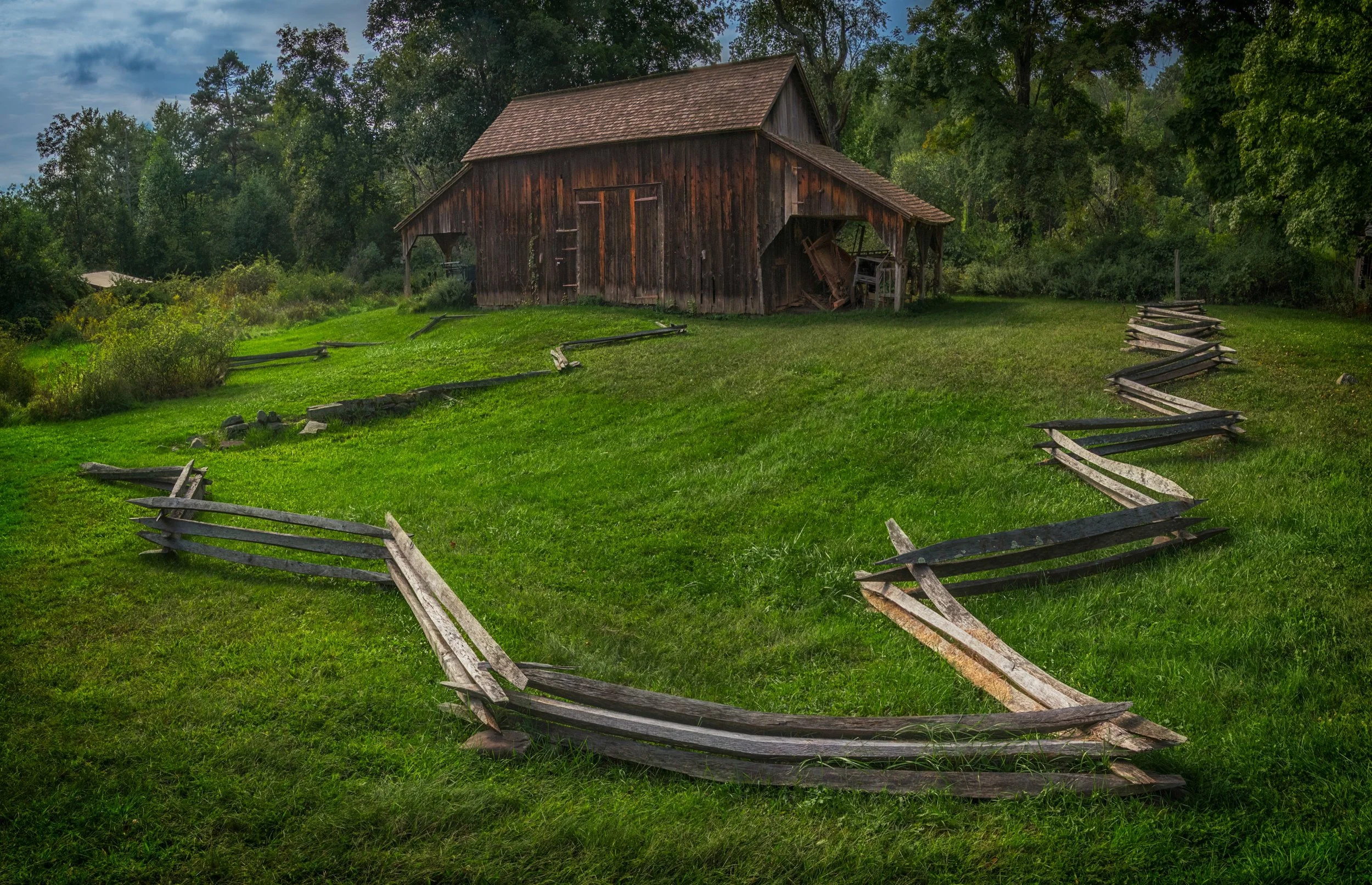 The Fence...
HDR panorama
Five verticals, 3 exposures each, merged to a DNG file in Adobe ACR
I tried a single exposure first, not pleasing, so I switched to exposure bracketing. I also tried a single horinzontal compsotion first and the fence just d