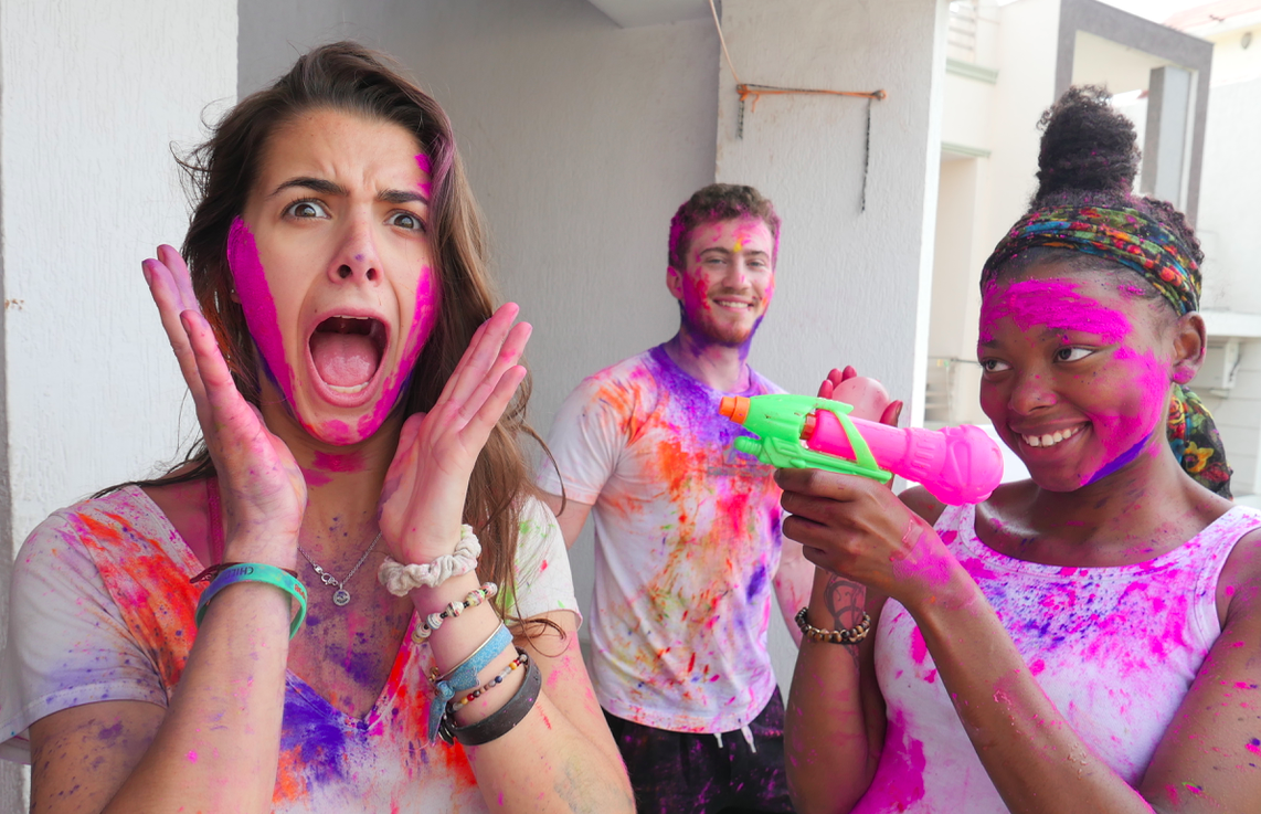 Celebrating and playing Holi
