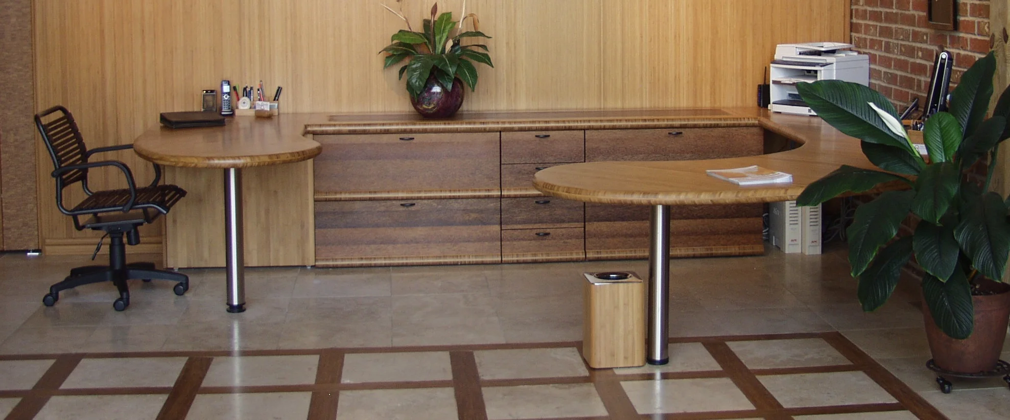 A work space should never be this clean…It was new. The tops are a double layer of 1” bamboo 3-ply; the credenza front is coco palm flat grain; the insert at right is edge grain coco palm.