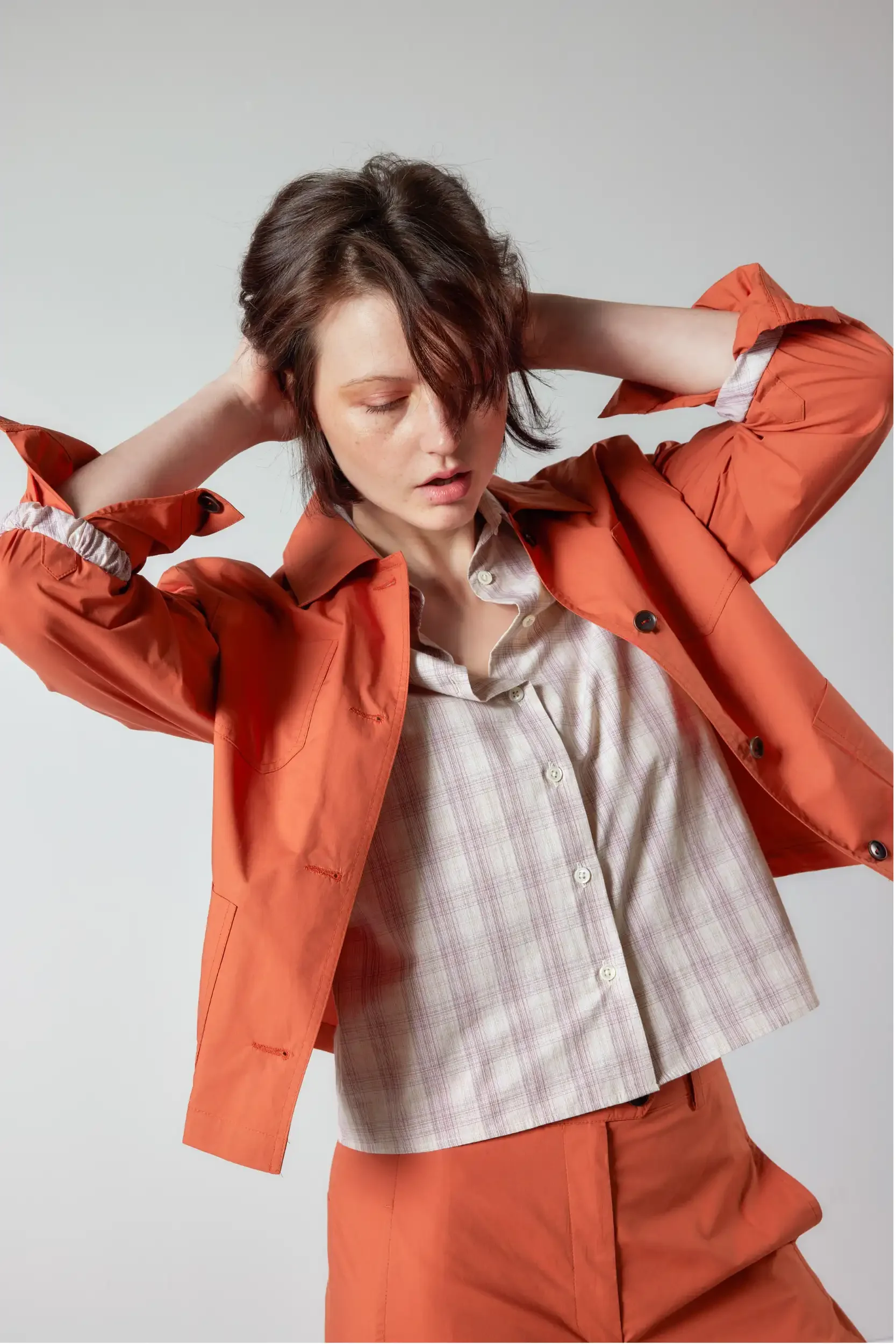 Annette-rufeger-Orange-Anzug.webp