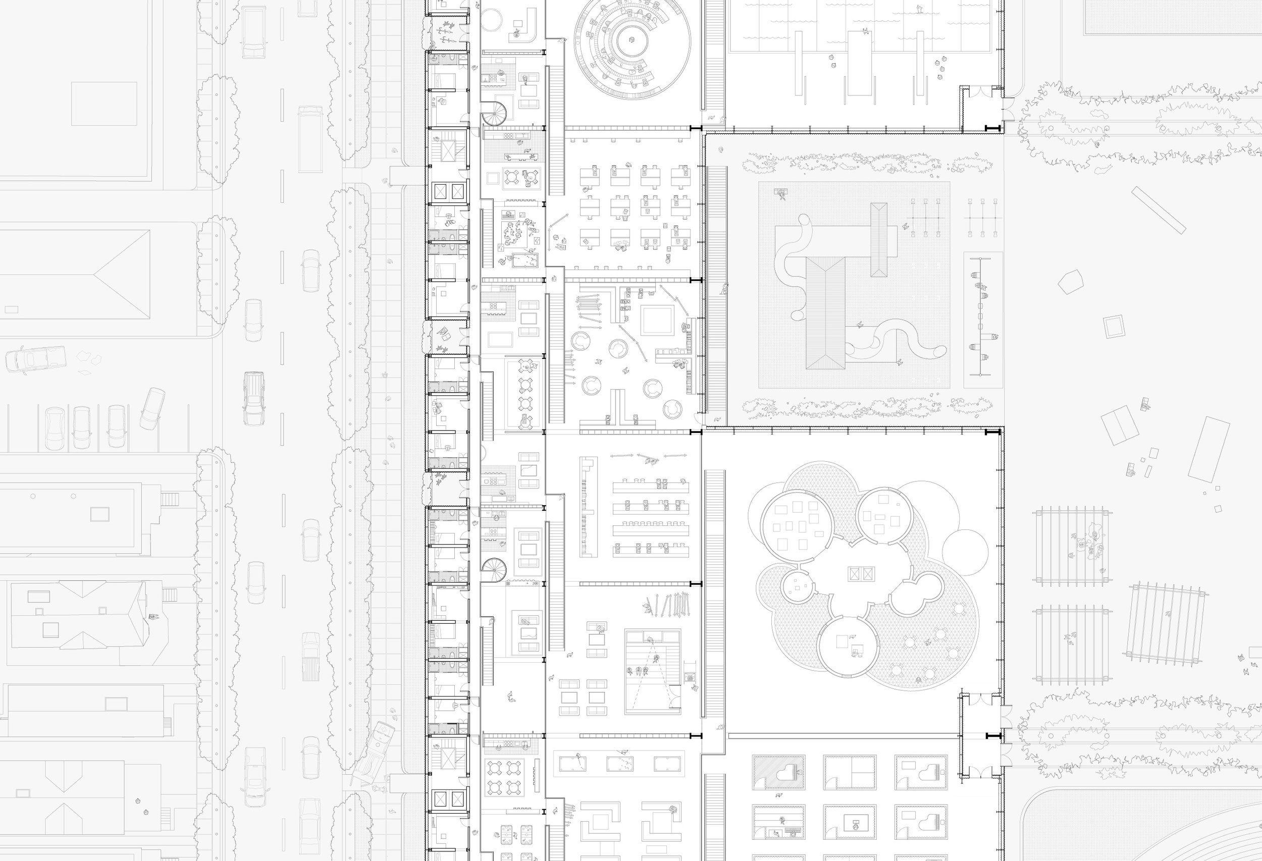 Interior spaces decrease geometrically in scale toward the exterior, becoming smaller and more intimate.