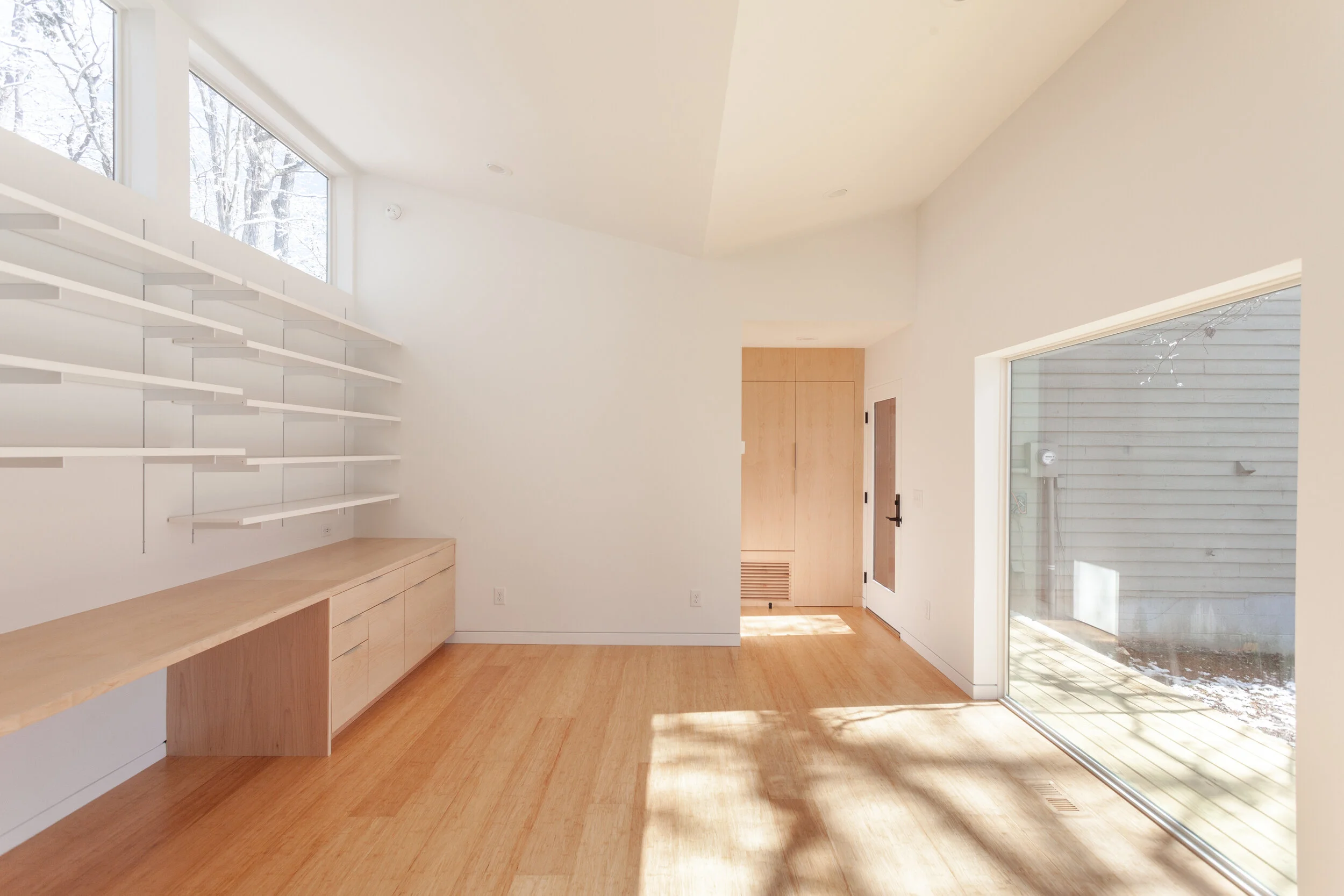  High North windows provide even daylight and tree views, while keeping privacy from neighbors. 