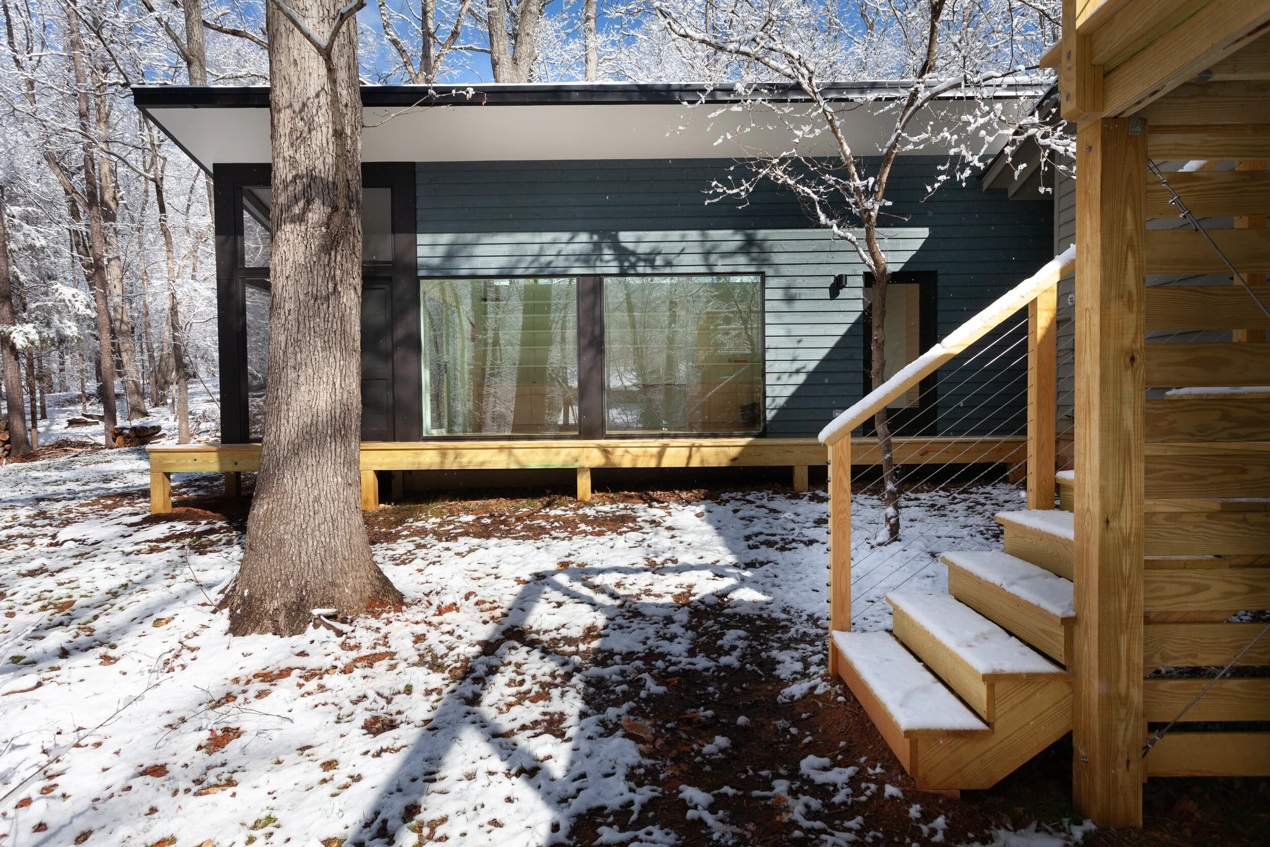  The addition and existing house form a courtyard-like outdoor area.  