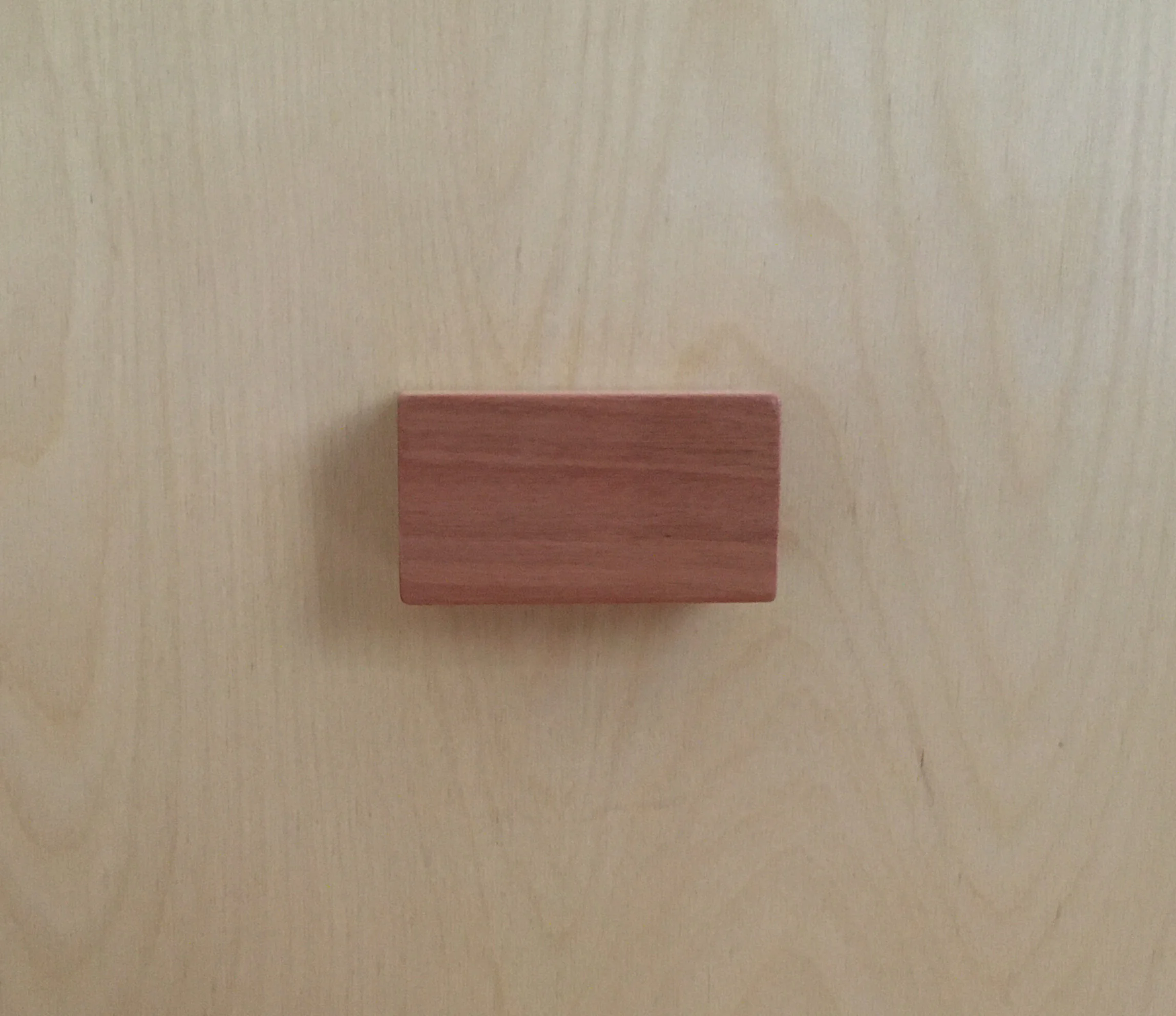  Two handles made of hardwood with a recessed bottom help to move it around   