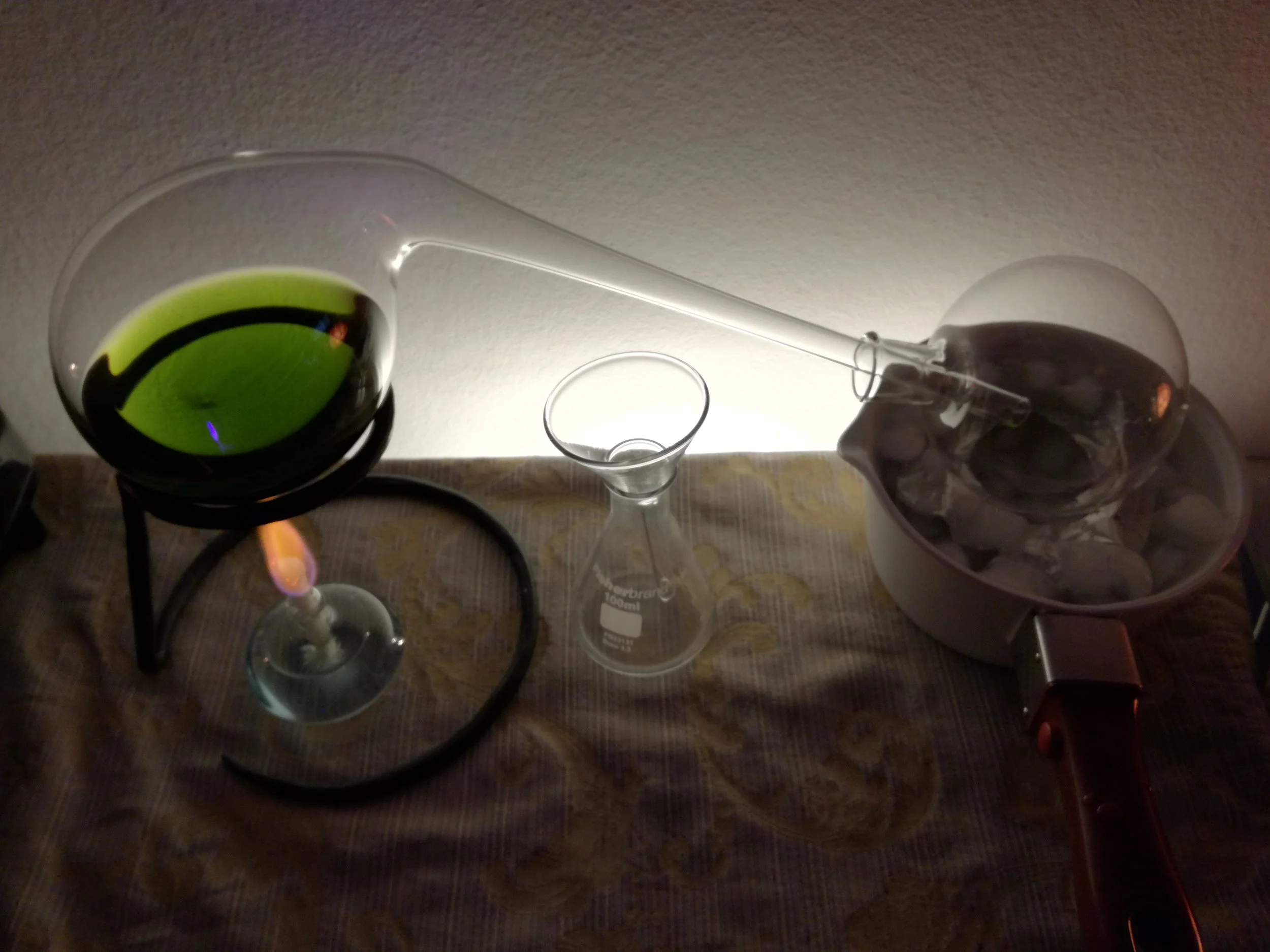 A small vintage style retort. With a glass spiritus-burner.