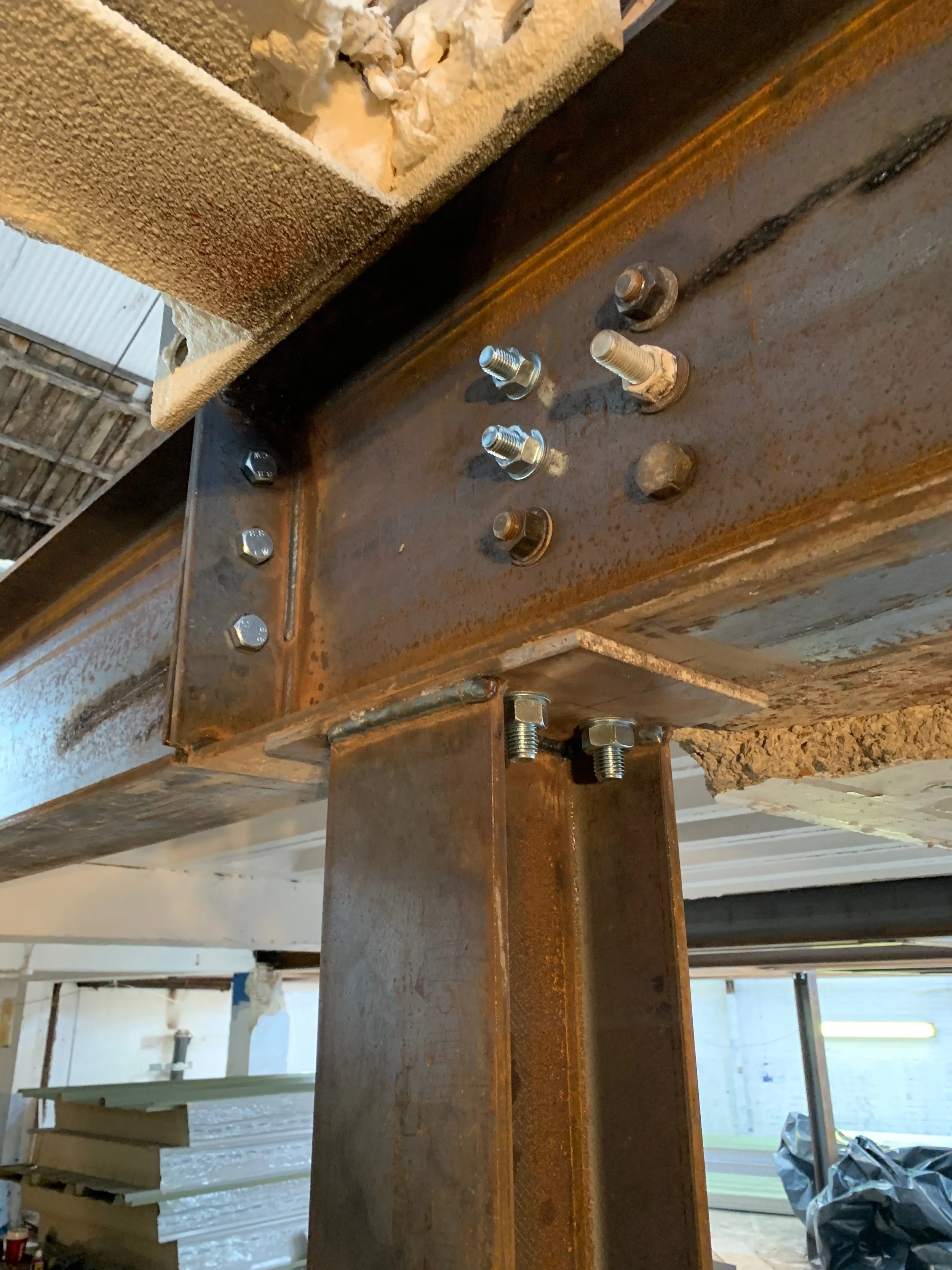 Master craftsmen fabricating new steelwork