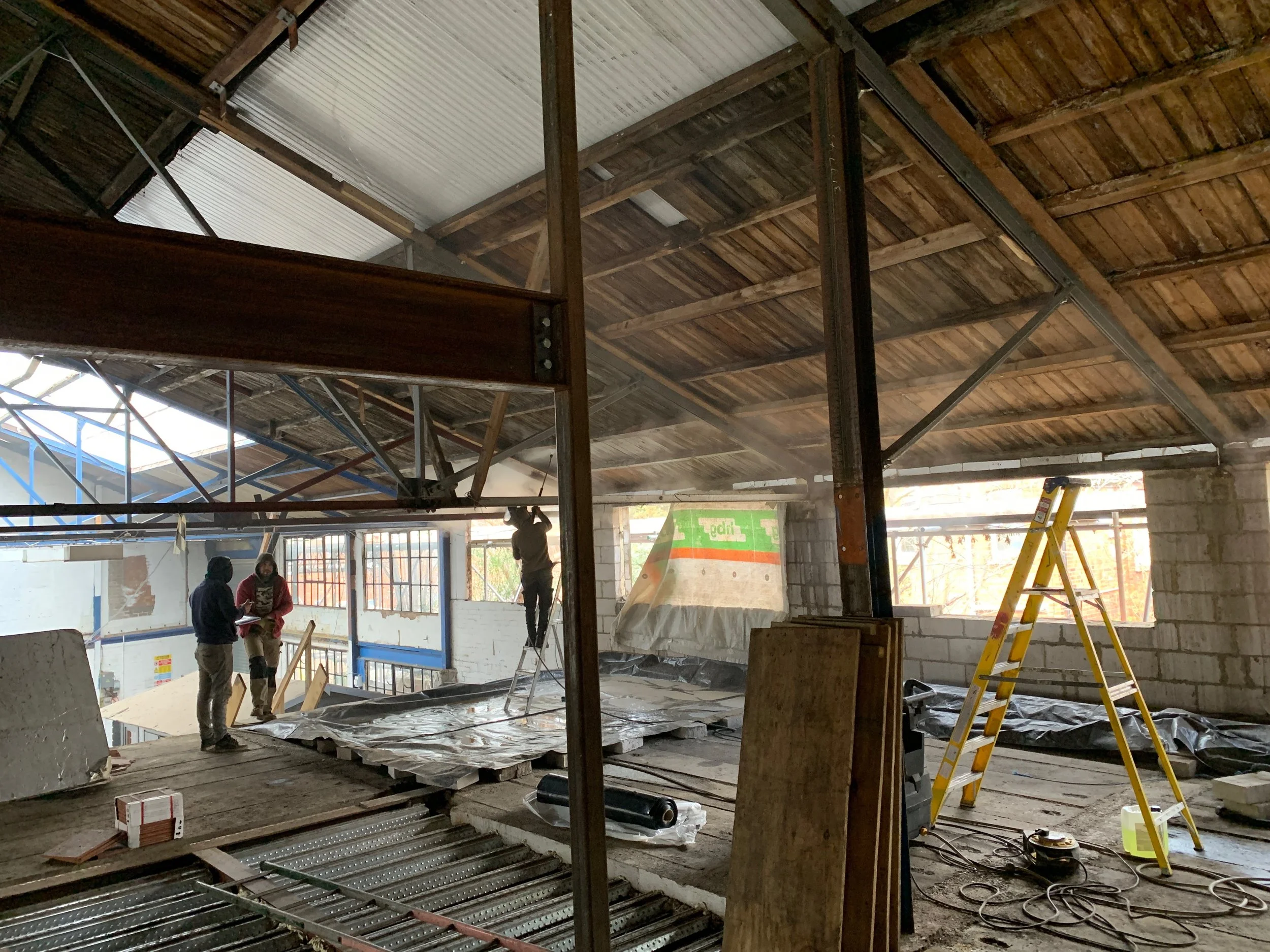 Steam cleaning underside of timber trusses