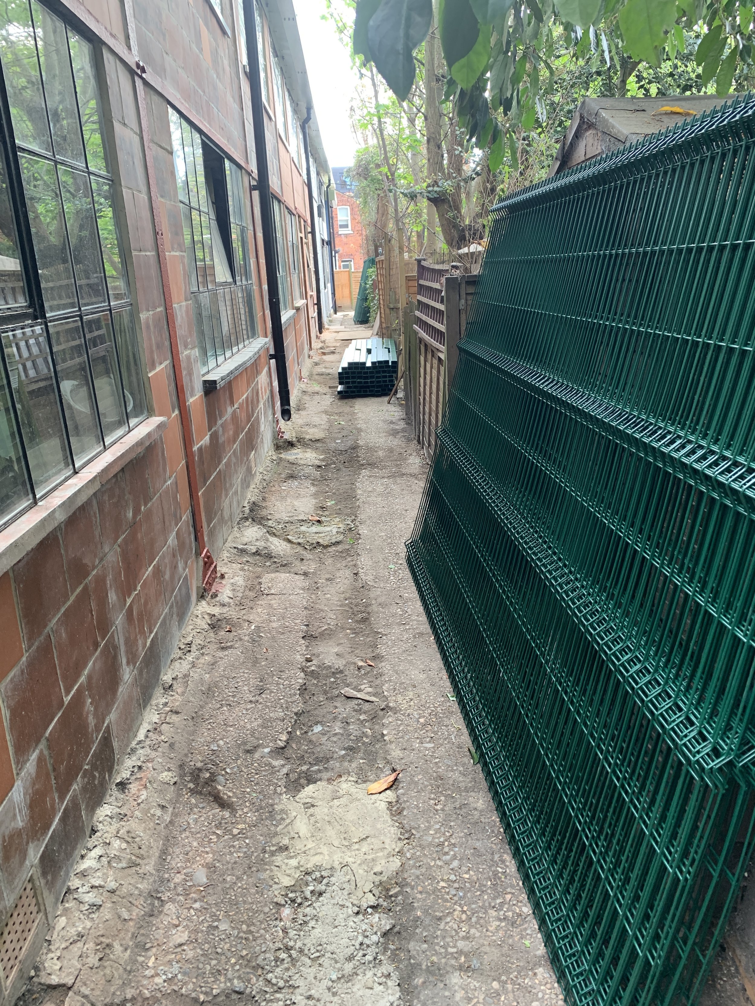 Scaffolding down at last, fencing next