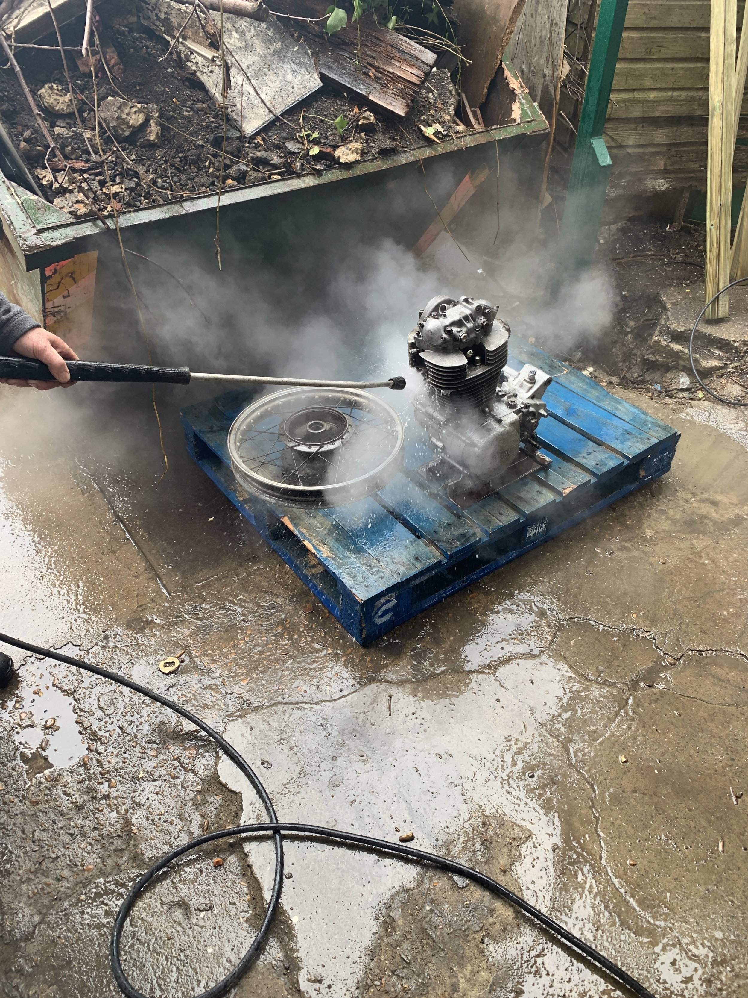 Steam cleaner in action on Russells' 1970 Yamaha 500 XT lump