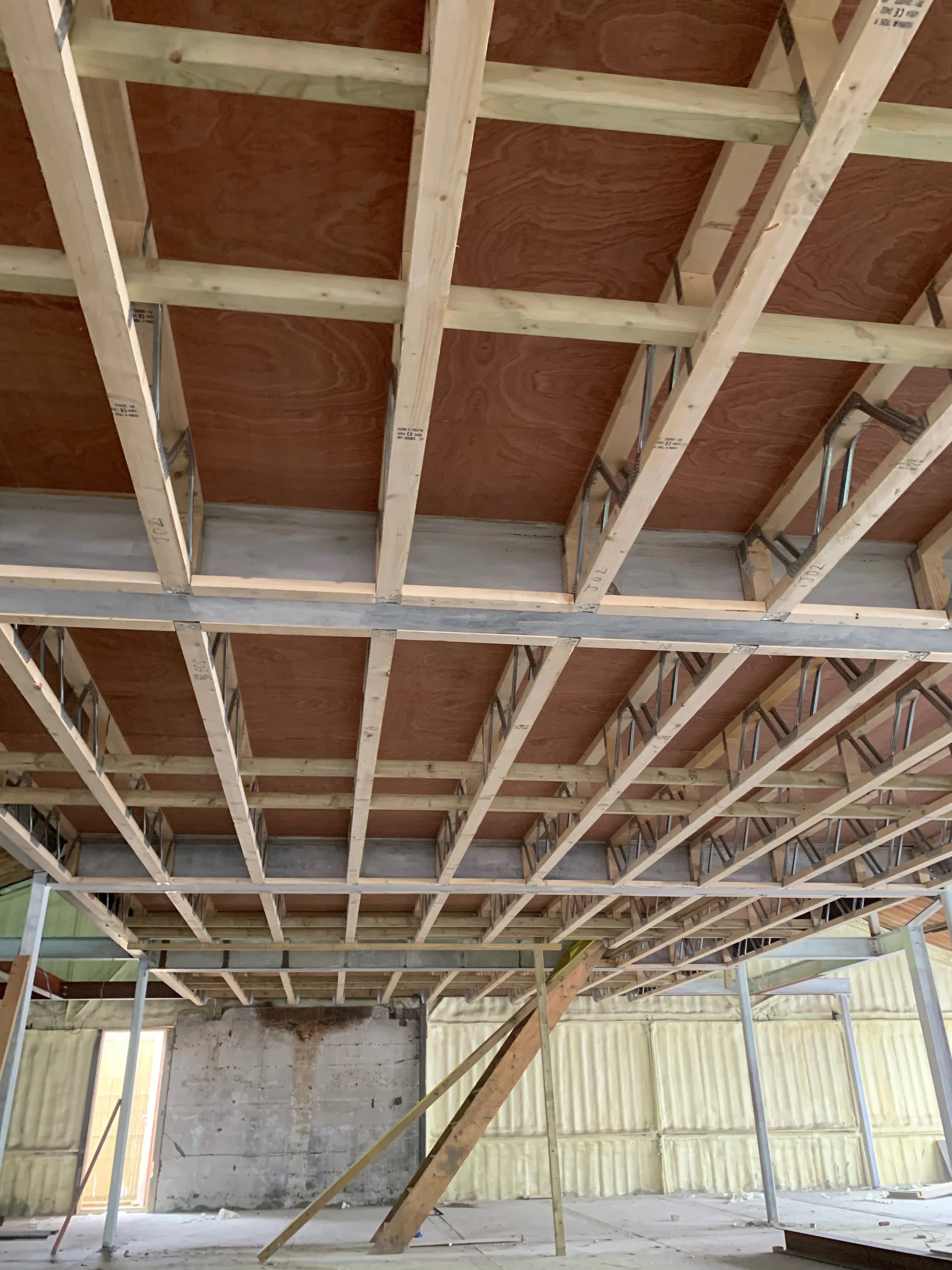 Underside of lightweight second floor timber deck using Posi Joists to allow services