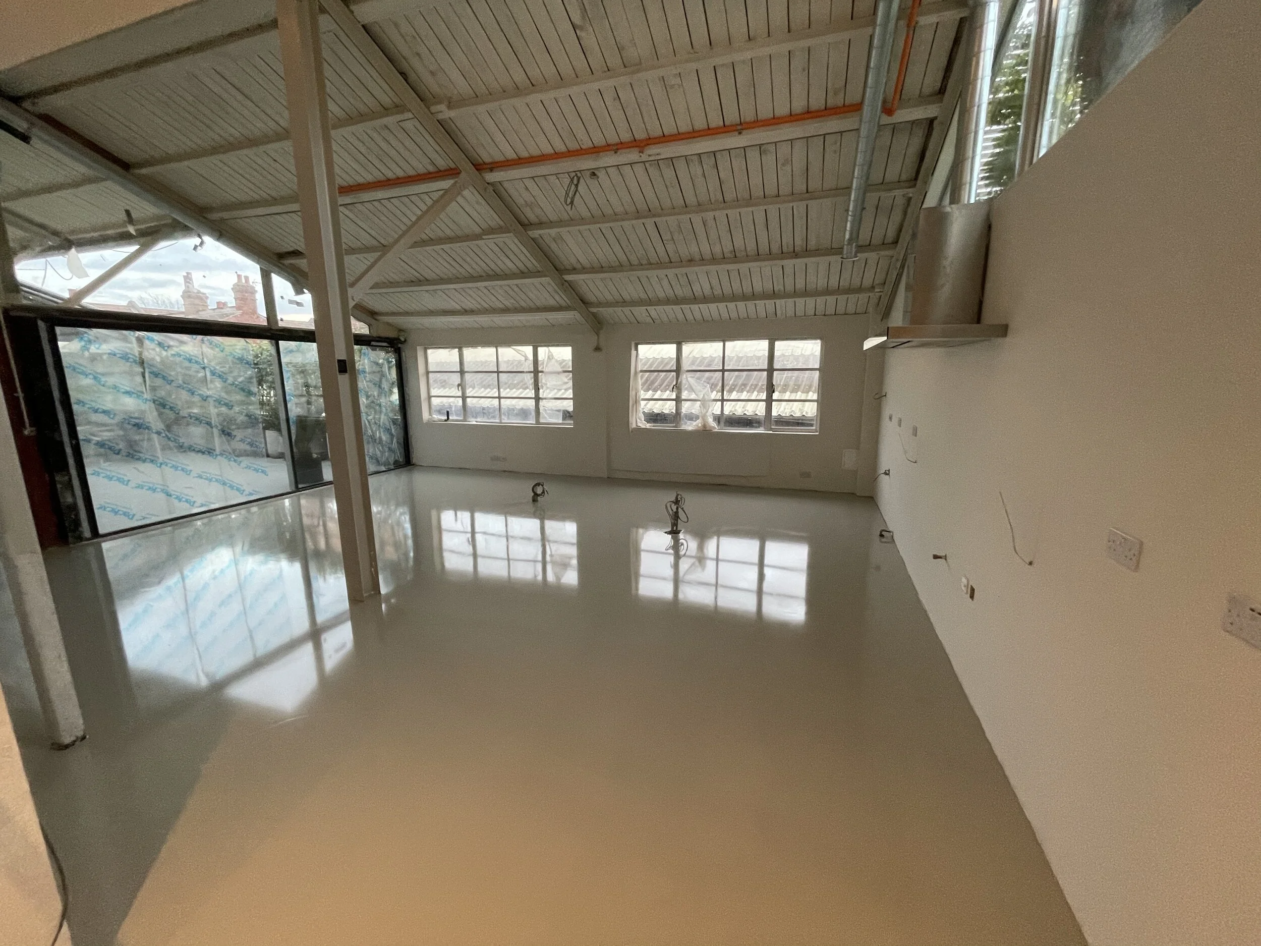Pebble grey Resin floors poured in penthouse